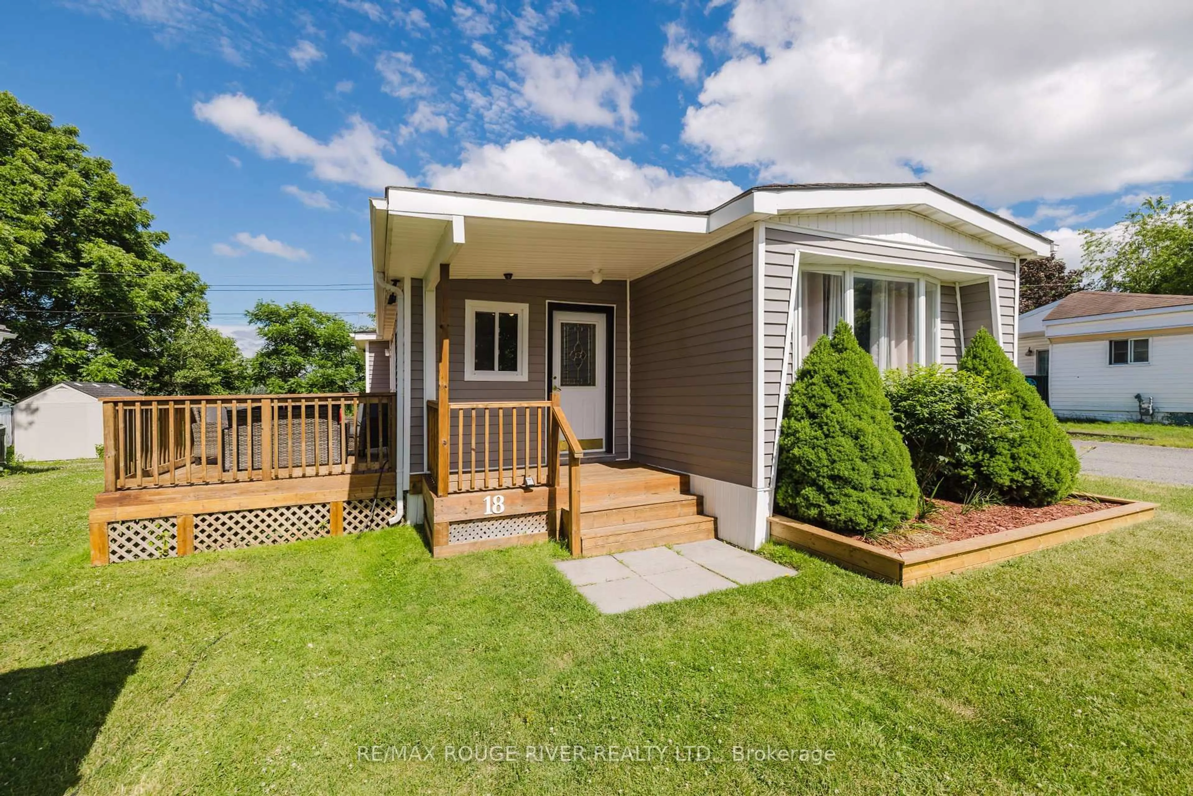 Home with vinyl exterior material, street for 18 Basher Dr, Hamilton Township Ontario K9A 4J7