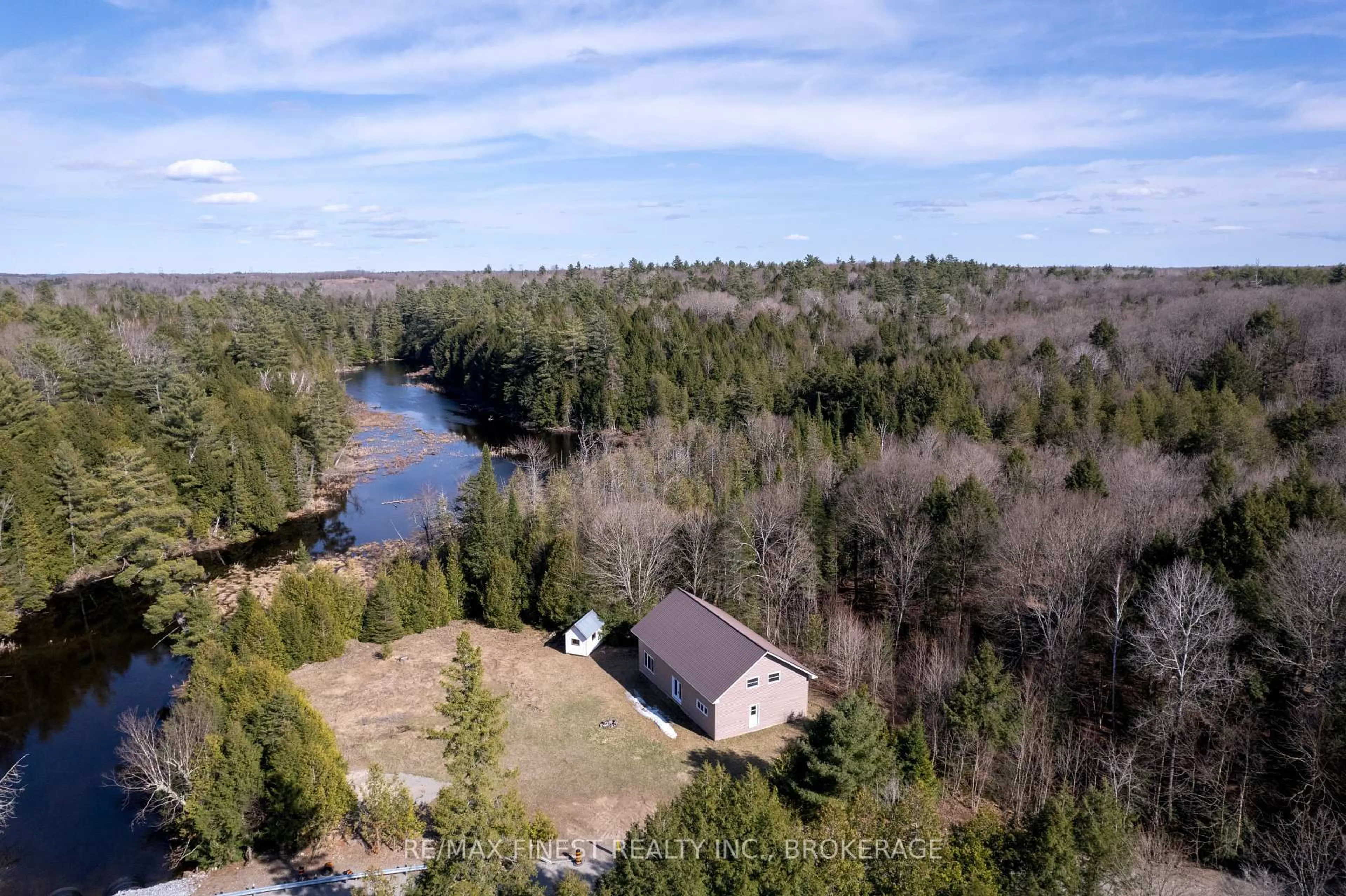A pic from outside/outdoor area/front of a property/back of a property/a pic from drone, water/lake/river/ocean view for 1975 North Rd, Plevna Ontario K0H 2M0