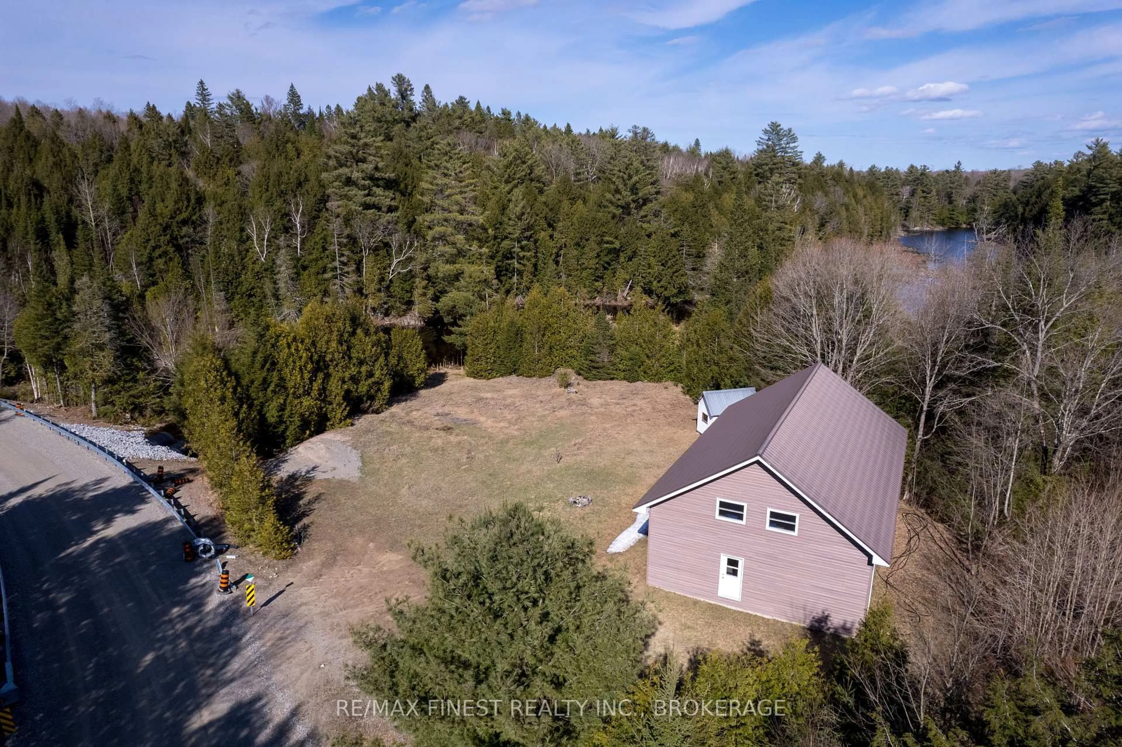 A pic from outside/outdoor area/front of a property/back of a property/a pic from drone, forest/trees view for 1975 North Rd, Plevna Ontario K0H 2M0