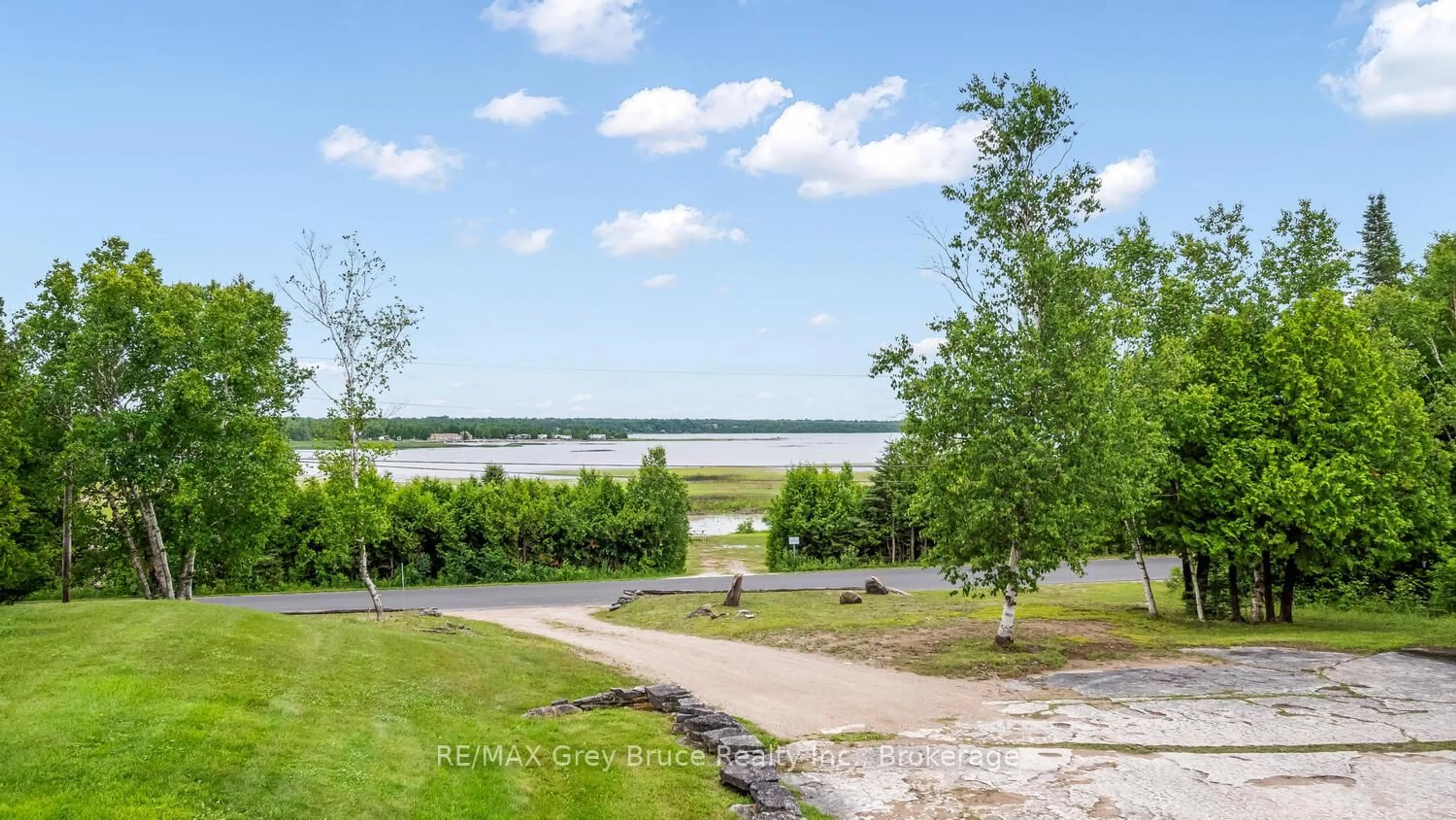 A pic from outside/outdoor area/front of a property/back of a property/a pic from drone, water/lake/river/ocean view for 68 Tamarac Rd, Northern Bruce Peninsula Ontario N0H 2M0