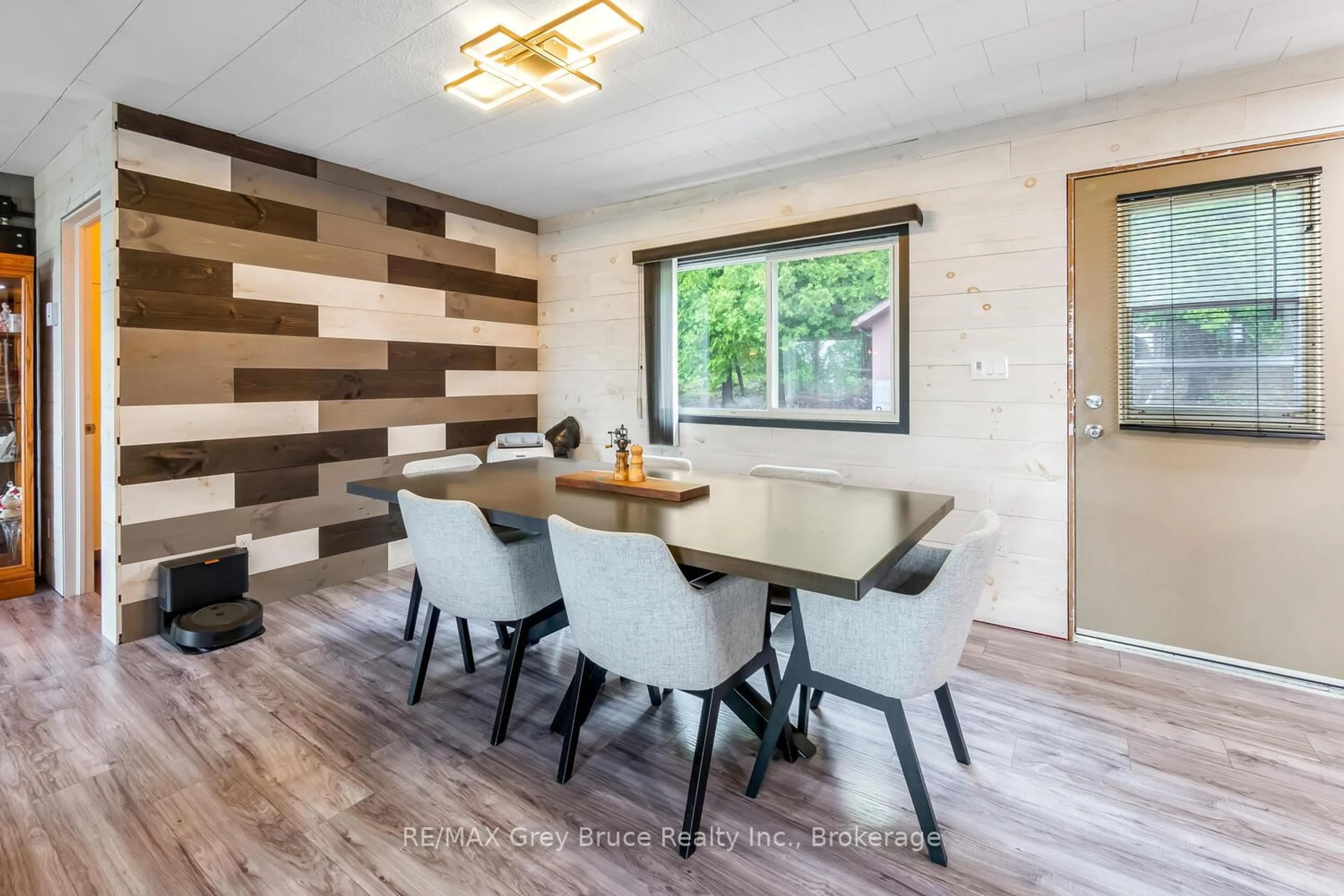 Dining room, wood/laminate floor for 68 Tamarac Rd, Northern Bruce Peninsula Ontario N0H 2M0