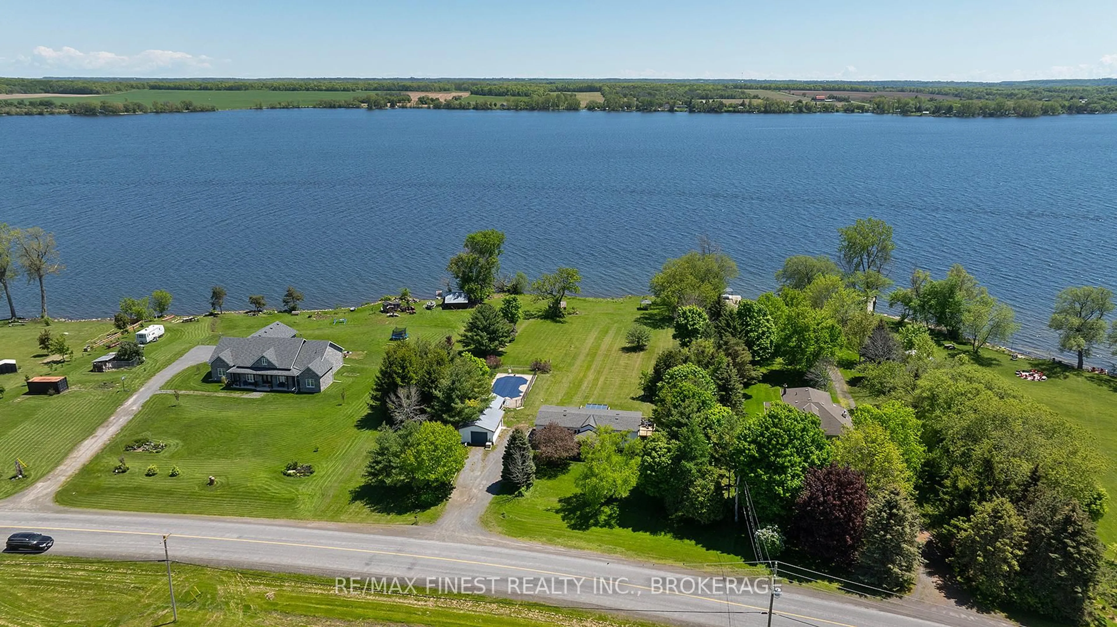 A pic from outside/outdoor area/front of a property/back of a property/a pic from drone, water/lake/river/ocean view for 4225 County Road 9, Napanee Ontario K7R 3K8