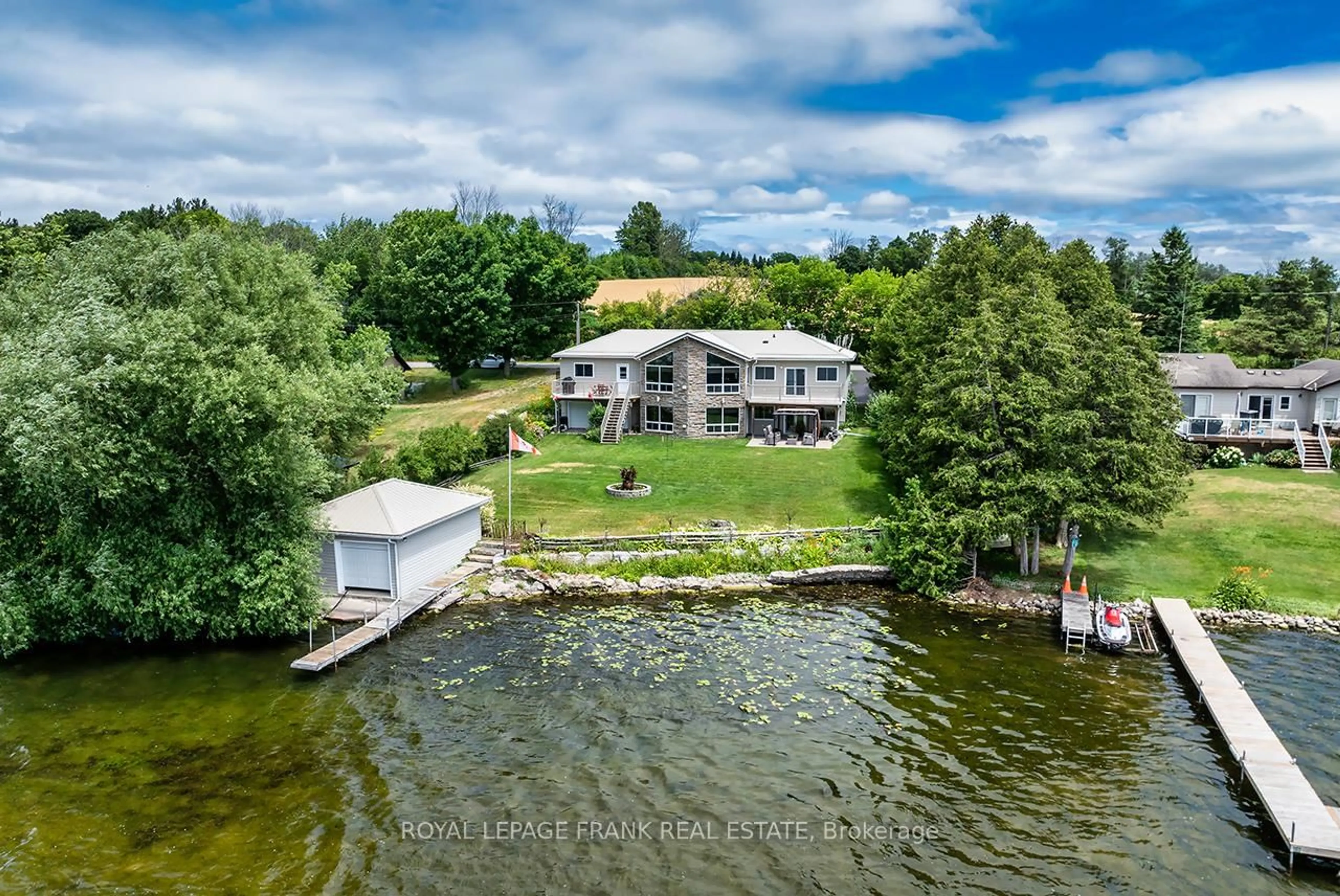 A pic from outside/outdoor area/front of a property/back of a property/a pic from drone, water/lake/river/ocean view for 115 Oakdene Cres, Kawartha Lakes Ontario K0M 2C0