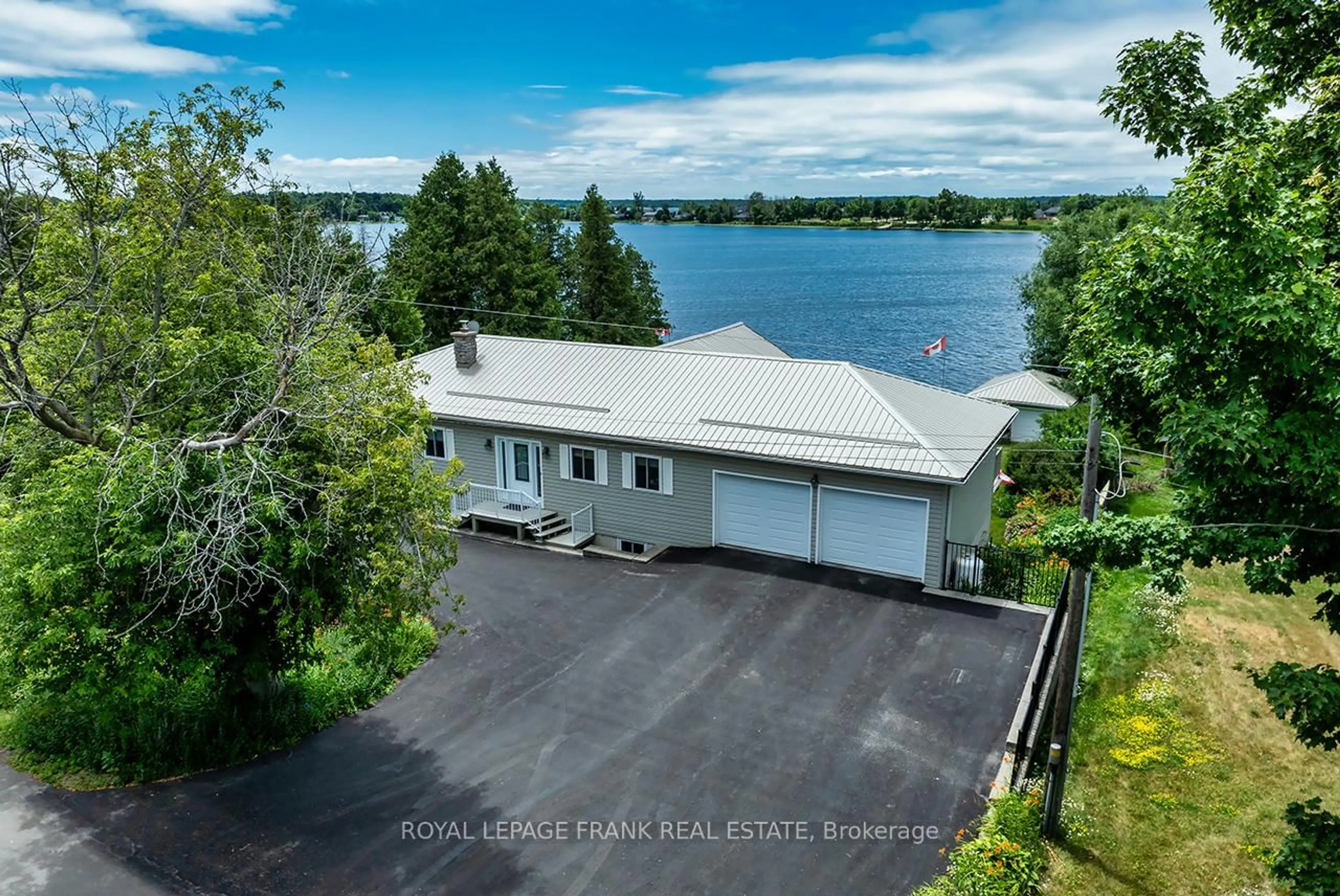 A pic from outside/outdoor area/front of a property/back of a property/a pic from drone, water/lake/river/ocean view for 115 Oakdene Cres, Kawartha Lakes Ontario K0M 2C0