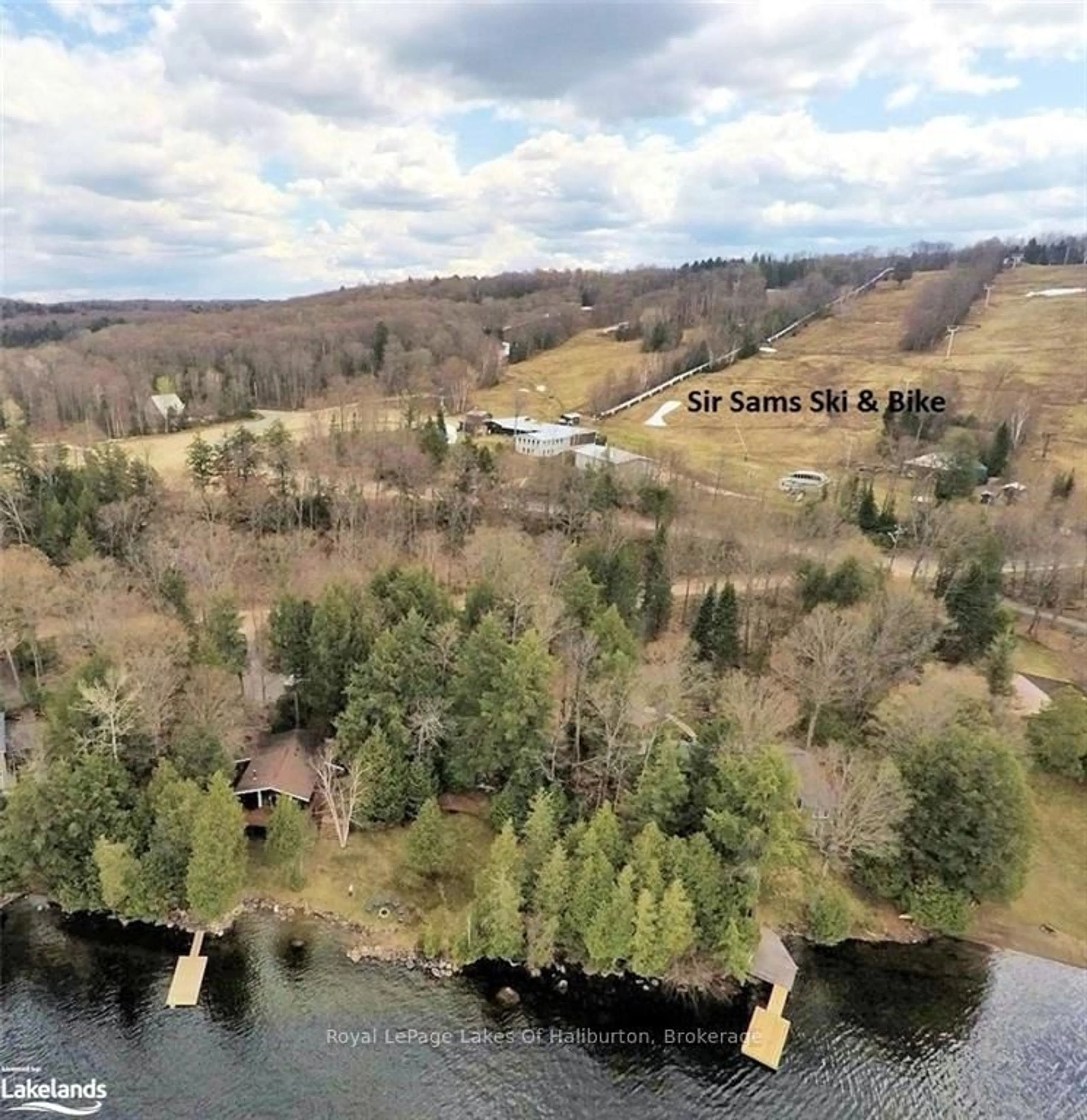 A pic from outside/outdoor area/front of a property/back of a property/a pic from drone, water/lake/river/ocean view for 1111 Elk Dr, Dysart et al Ontario K0M 1S0