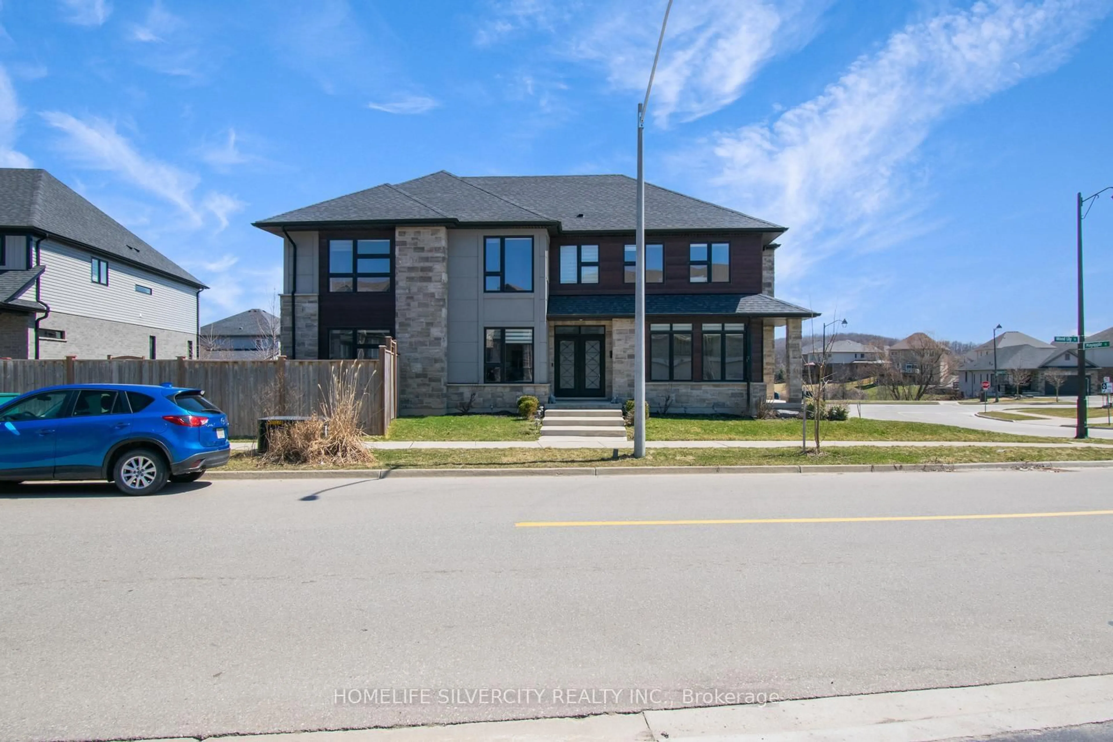 Home with brick exterior material, street for 556 Mayapple St, Waterloo Ontario N2V 0C3