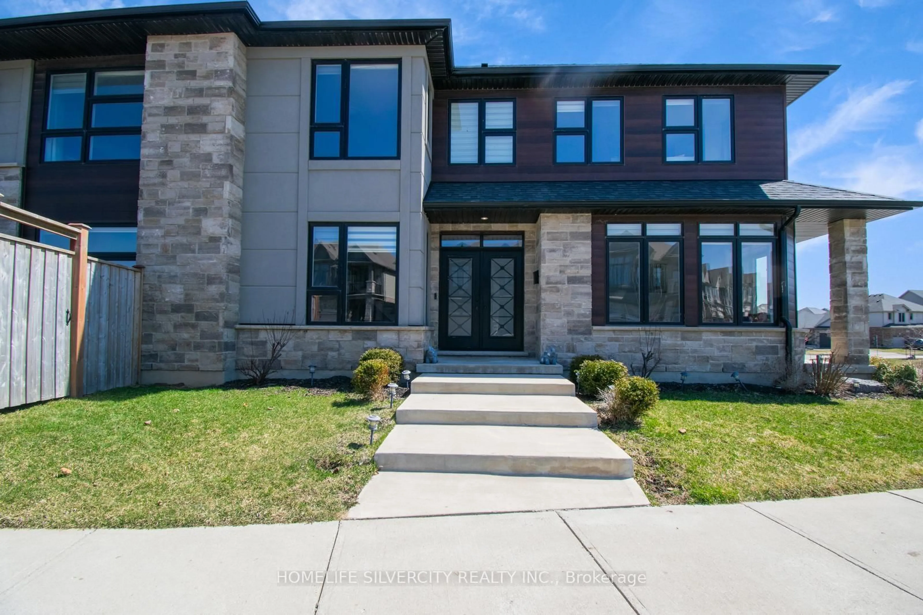 Home with brick exterior material, street for 556 Mayapple St, Waterloo Ontario N2V 0C3