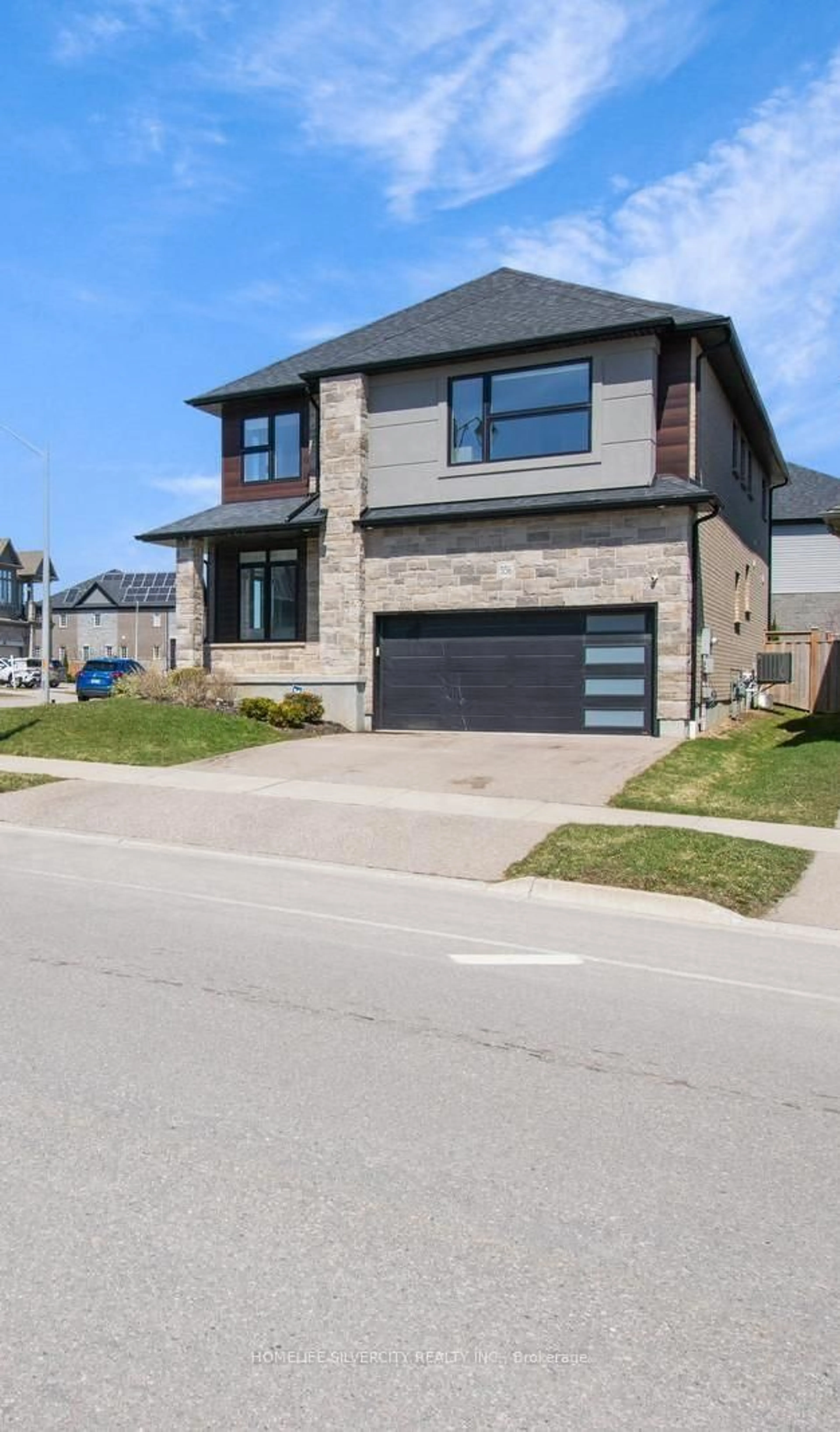 Home with brick exterior material, street for 556 Mayapple St, Waterloo Ontario N2V 0C3