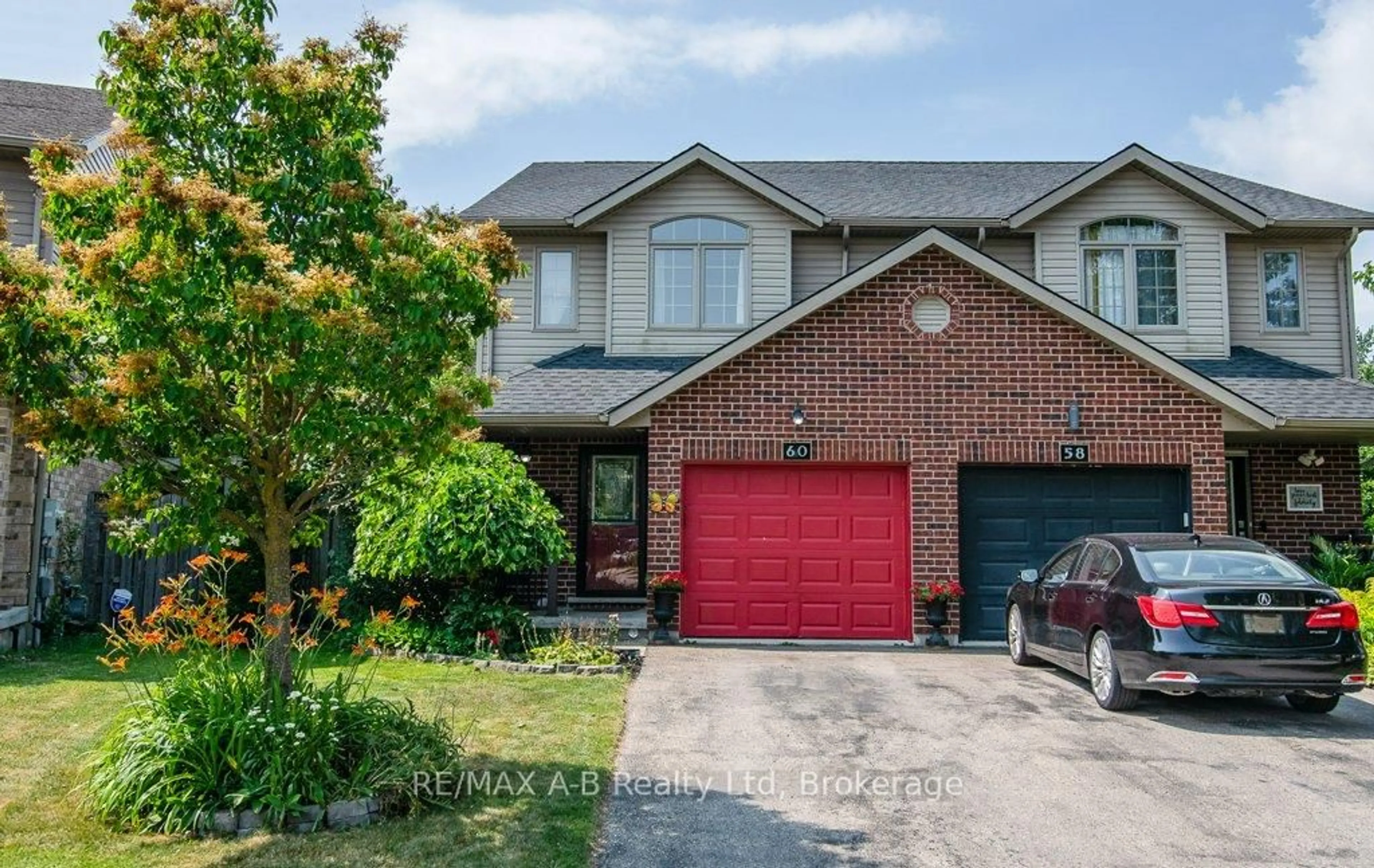 Home with brick exterior material, street for 60 College St, Stratford Ontario N5A 4R4