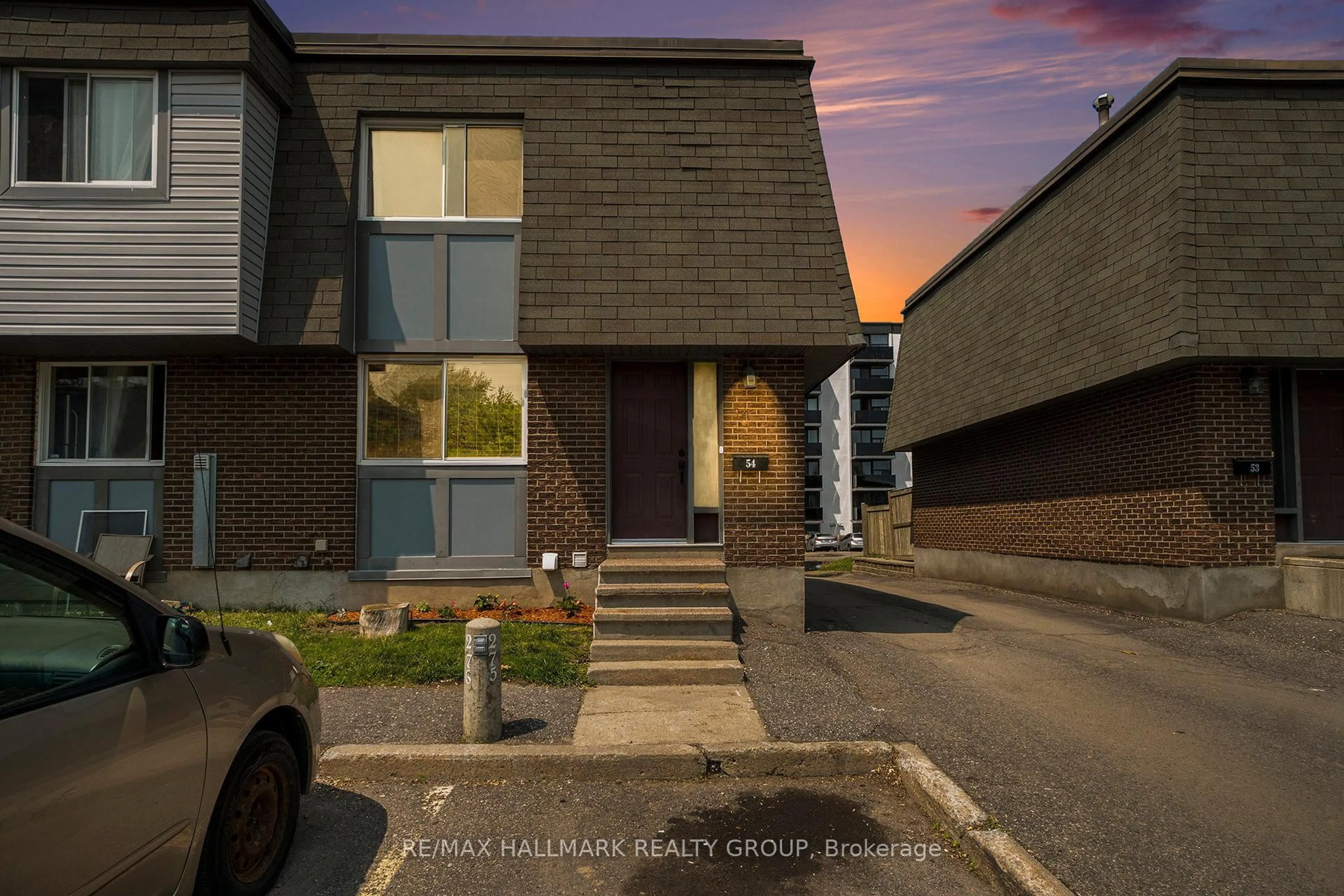 Home with brick exterior material, street for 54 Corley Private, Ottawa Ontario K1V 8T7