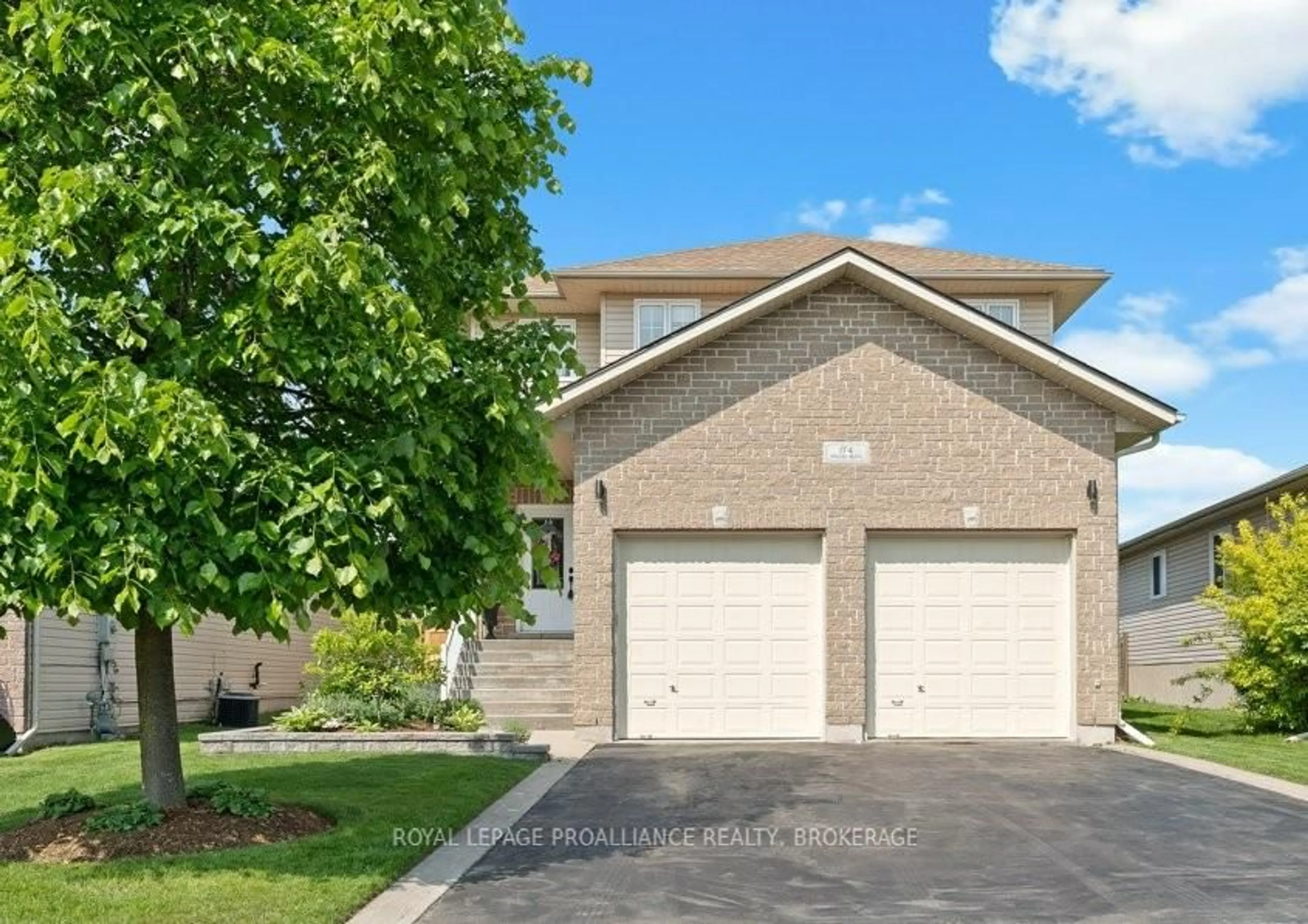Home with brick exterior material, street for 174 Speers Blvd, Loyalist Ontario K7N 1Y7