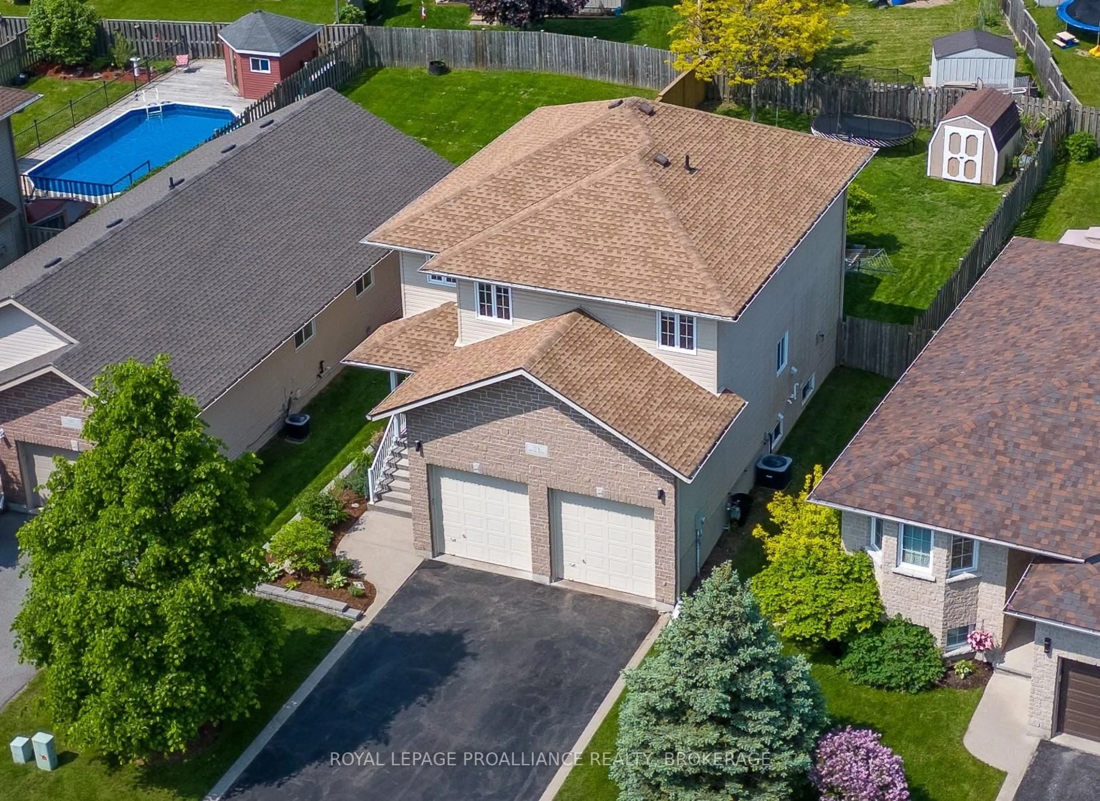 A pic from outside/outdoor area/front of a property/back of a property/a pic from drone, street for 174 Speers Blvd, Loyalist Ontario K7N 1Y7
