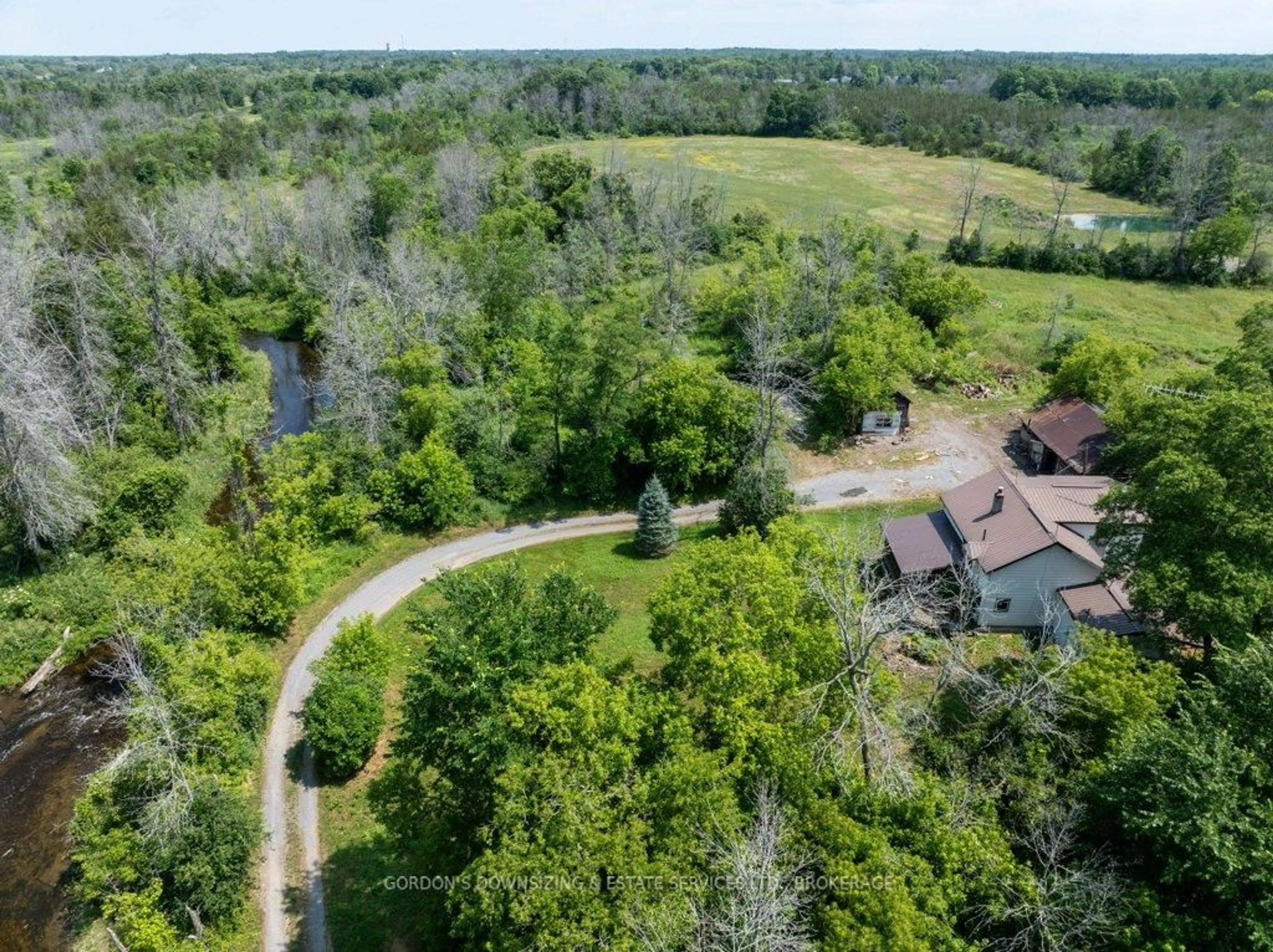 A pic from outside/outdoor area/front of a property/back of a property/a pic from drone, forest/trees view for 737 Chatterson Rd, Bissett Creek Ontario K0H 2H0