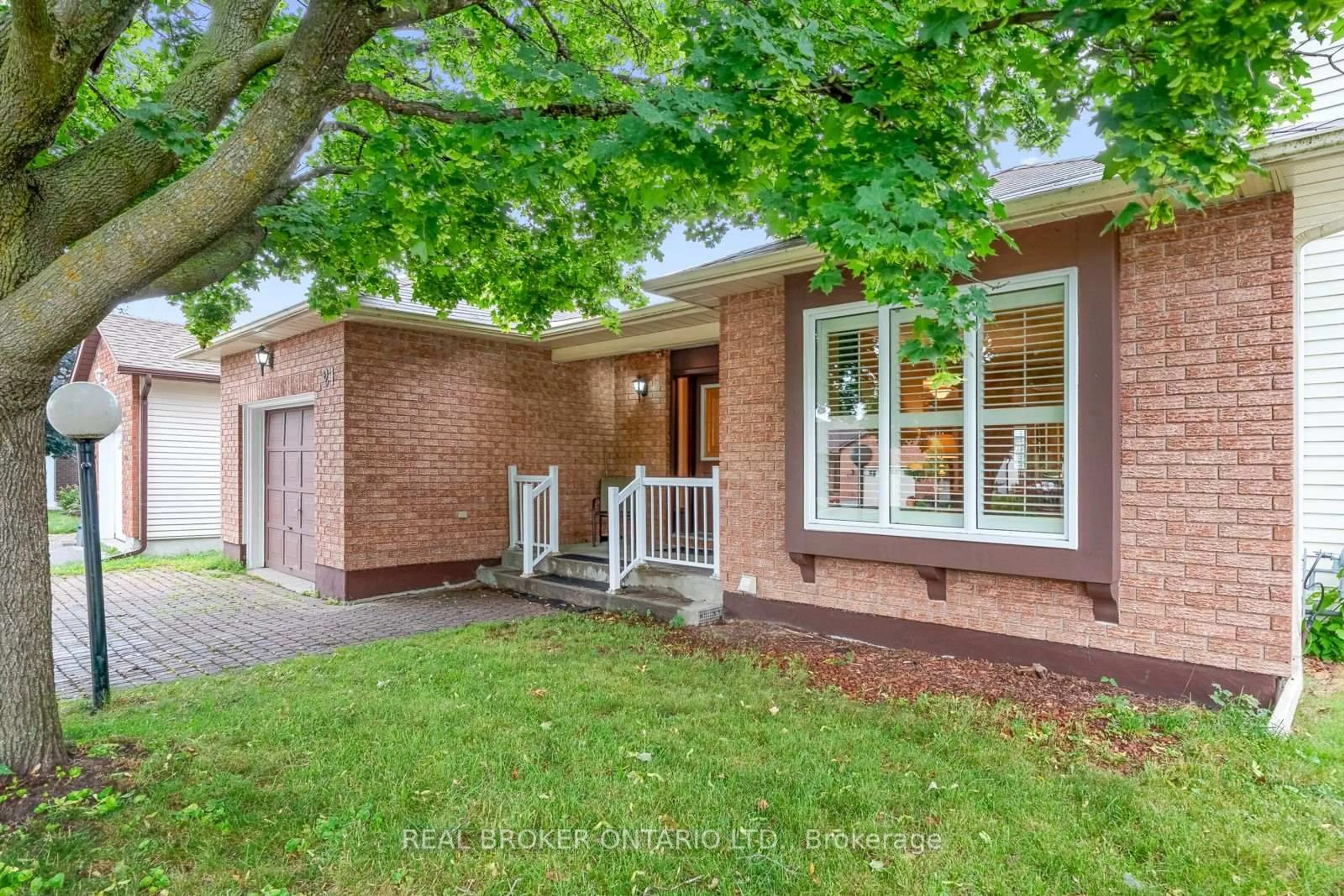 Home with brick exterior material, street for 21 Townsend Dr, Ottawa Ontario K2J 2T5