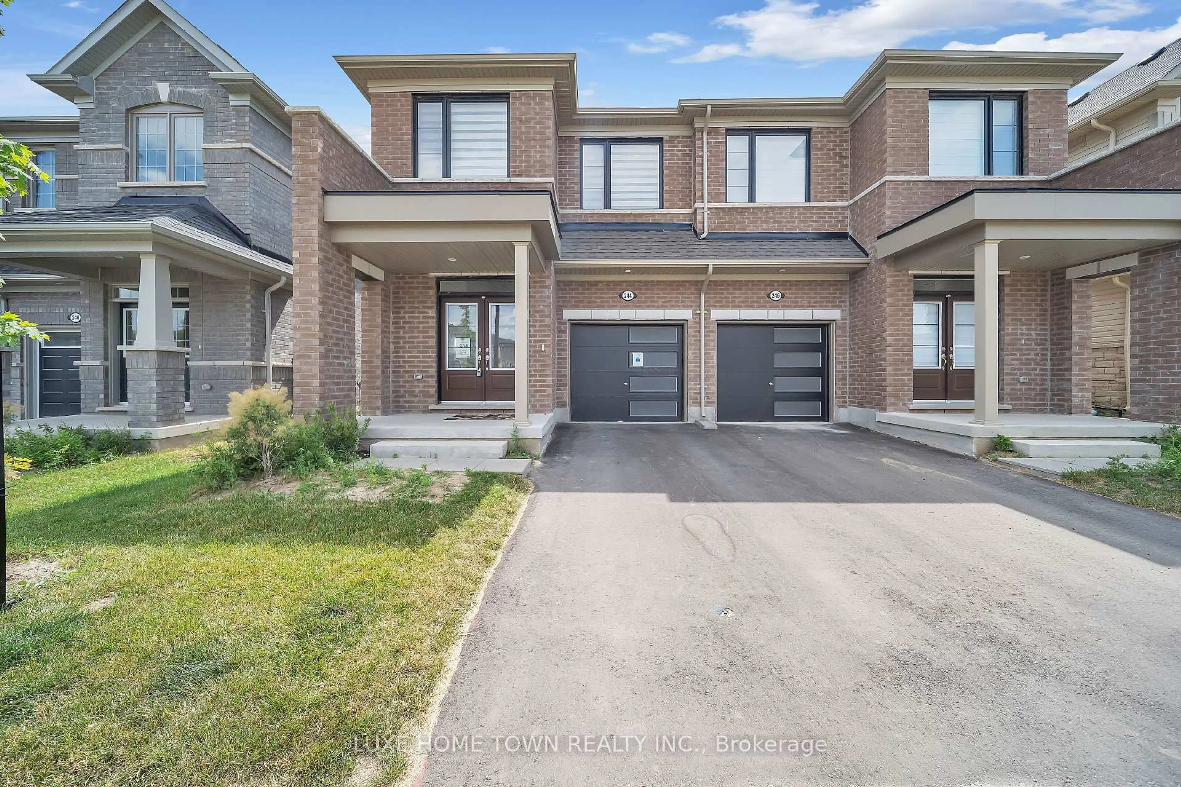 Home with brick exterior material, street for 244 Elliot Ave, Centre Wellington Ontario N1M 0J8