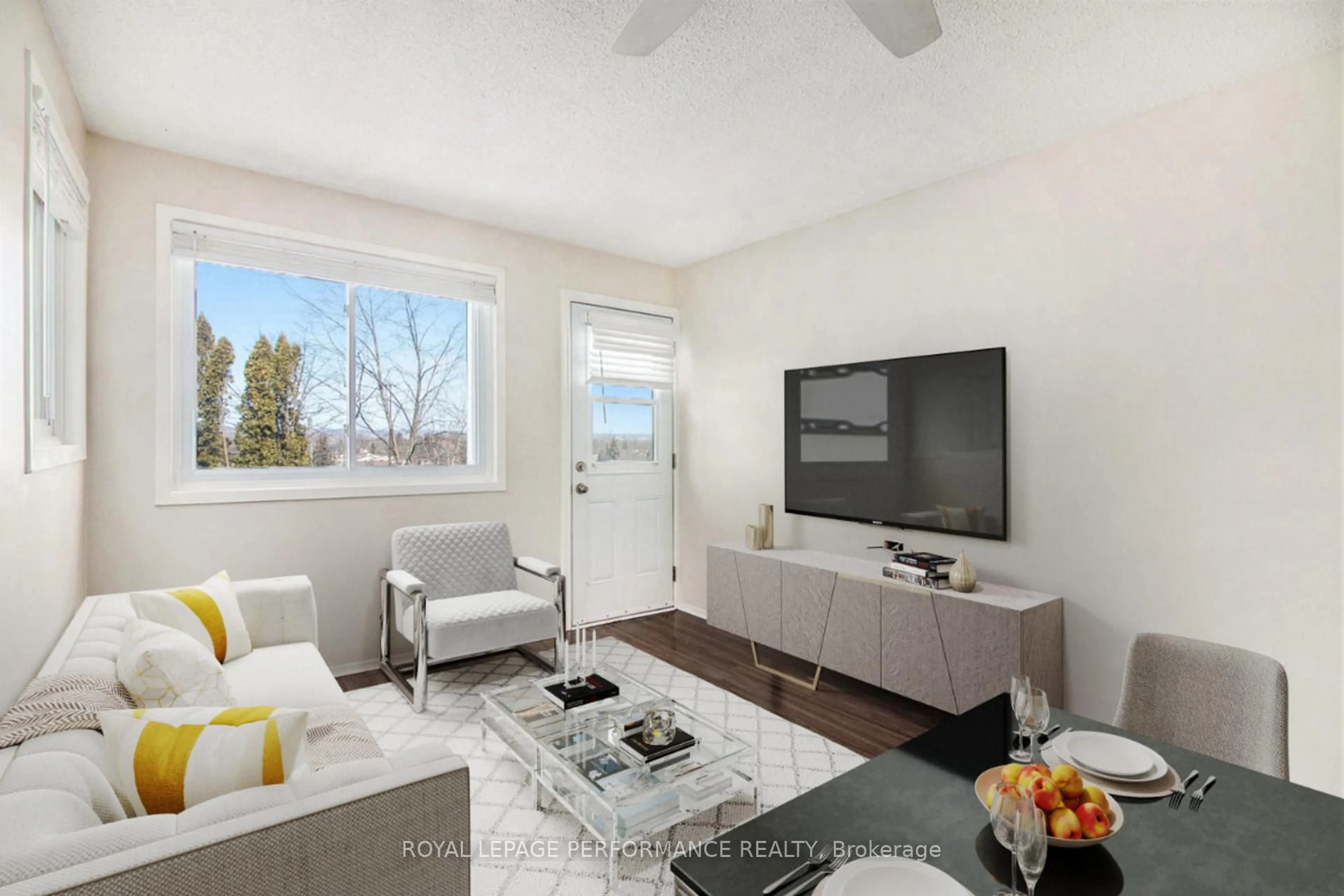 Living room with furniture, wood/laminate floor for 345 Centrum Blvd #208, Ottawa Ontario K1E 3W9