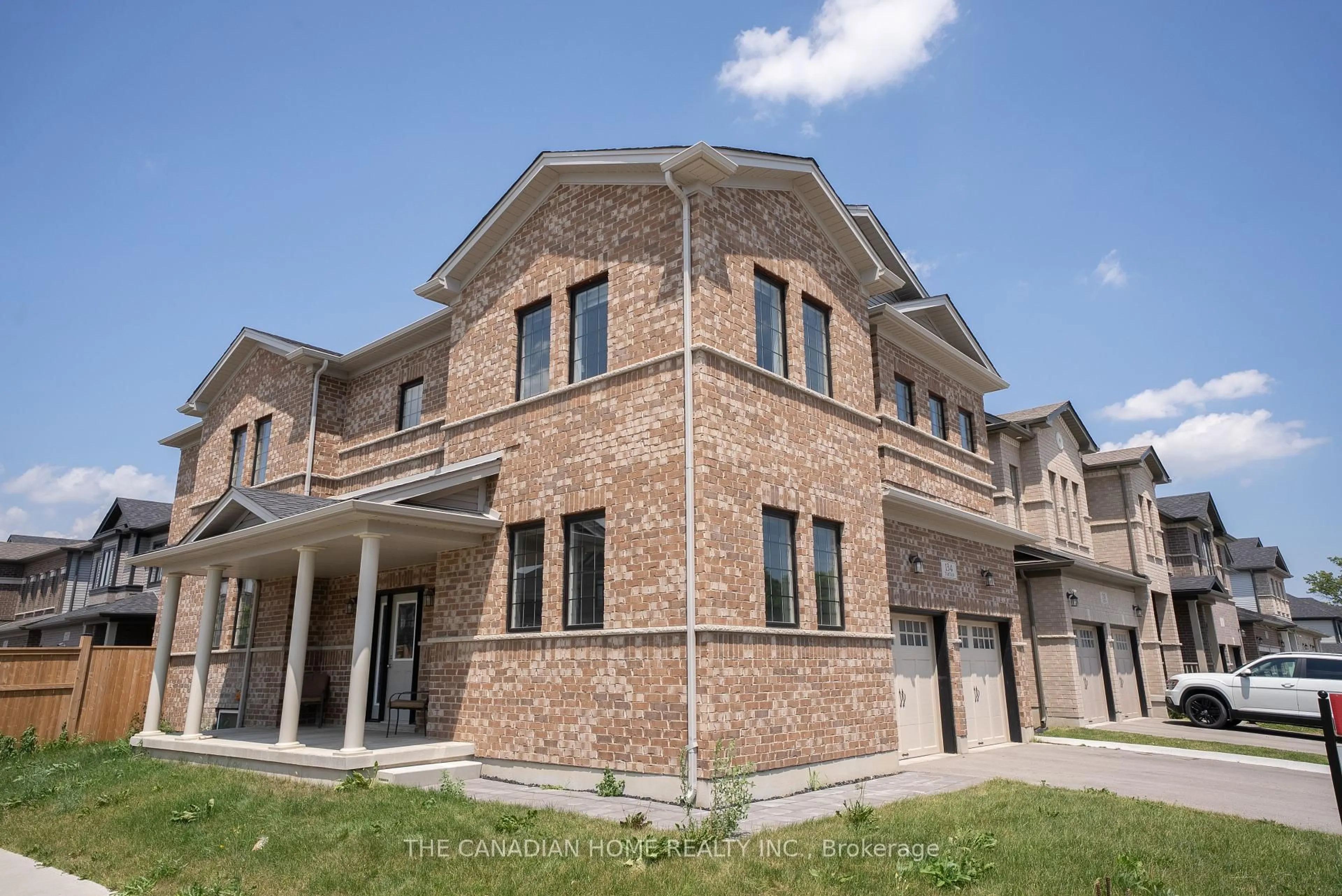 Home with brick exterior material, building for 134 Tartan Ave, Kitchener Ontario N2R 0N4