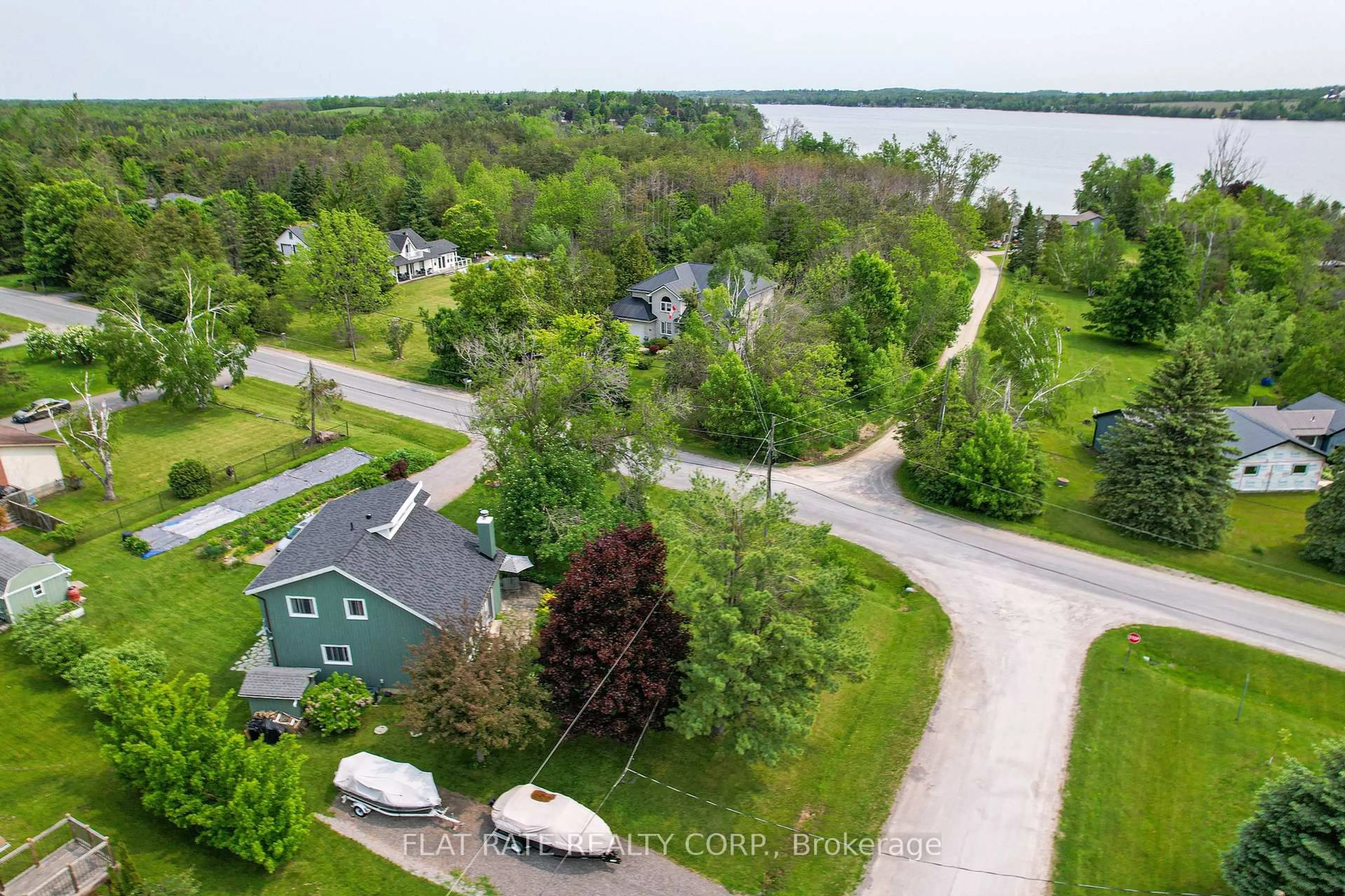 A pic from outside/outdoor area/front of a property/back of a property/a pic from drone, water/lake/river/ocean view for 610 Brick Rd, Selwyn Ontario K0L 1T0