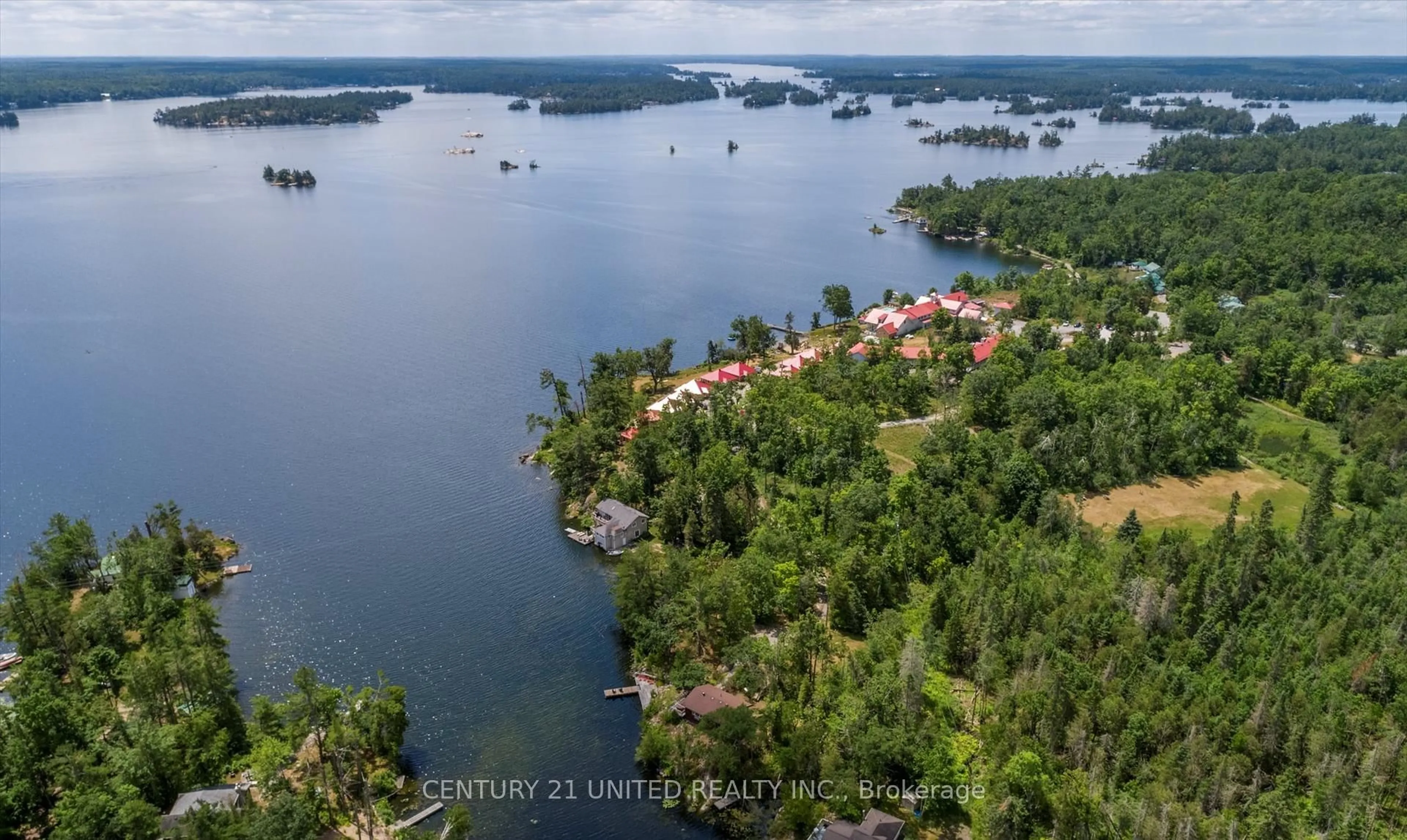 A pic from outside/outdoor area/front of a property/back of a property/a pic from drone, water/lake/river/ocean view for 65 Fire Route 8, North Kawartha Ontario K0L 3E0