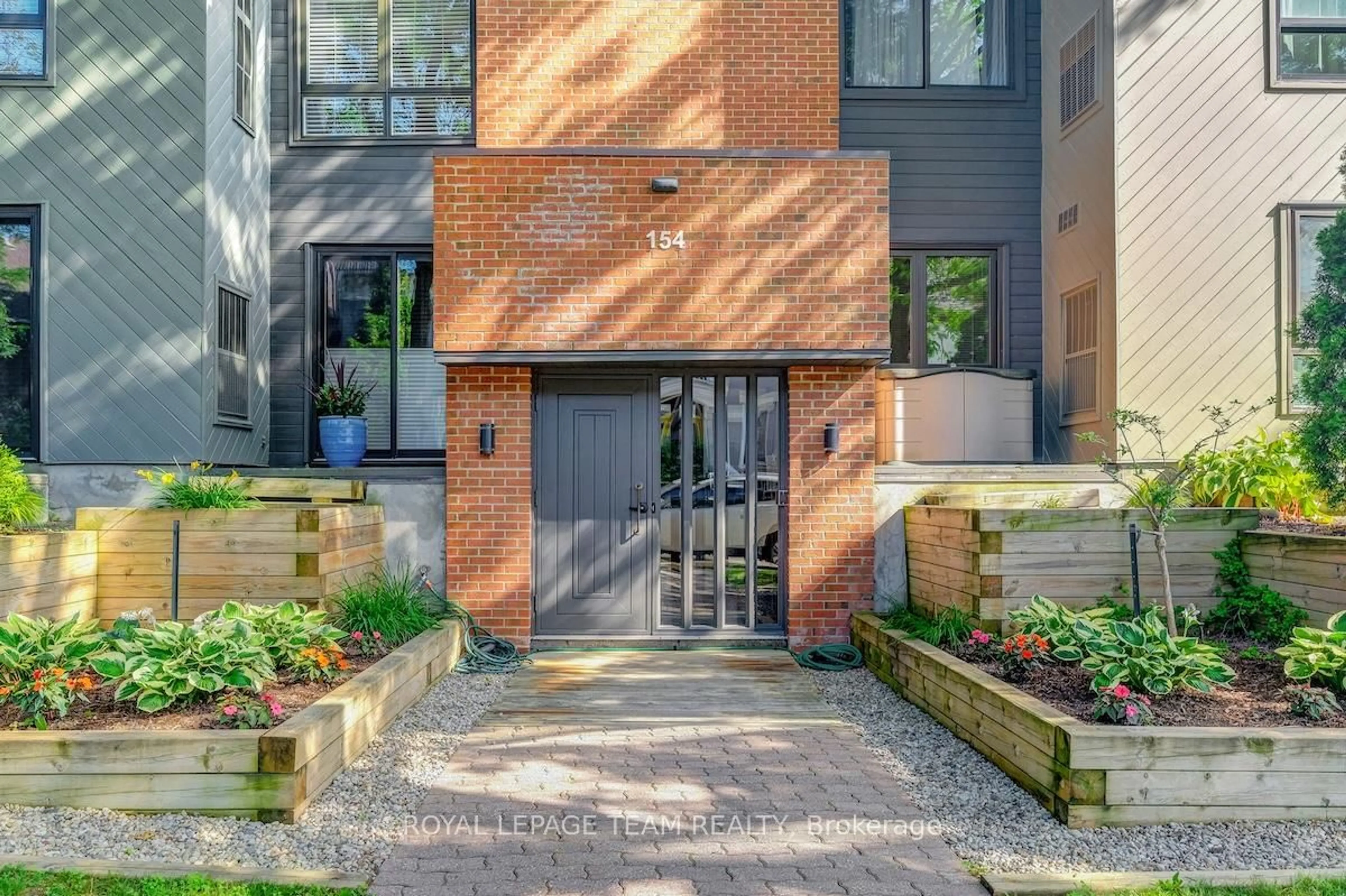 Home with brick exterior material, street for 154 Waverley St #2A, Ottawa Ontario K2P 0V4