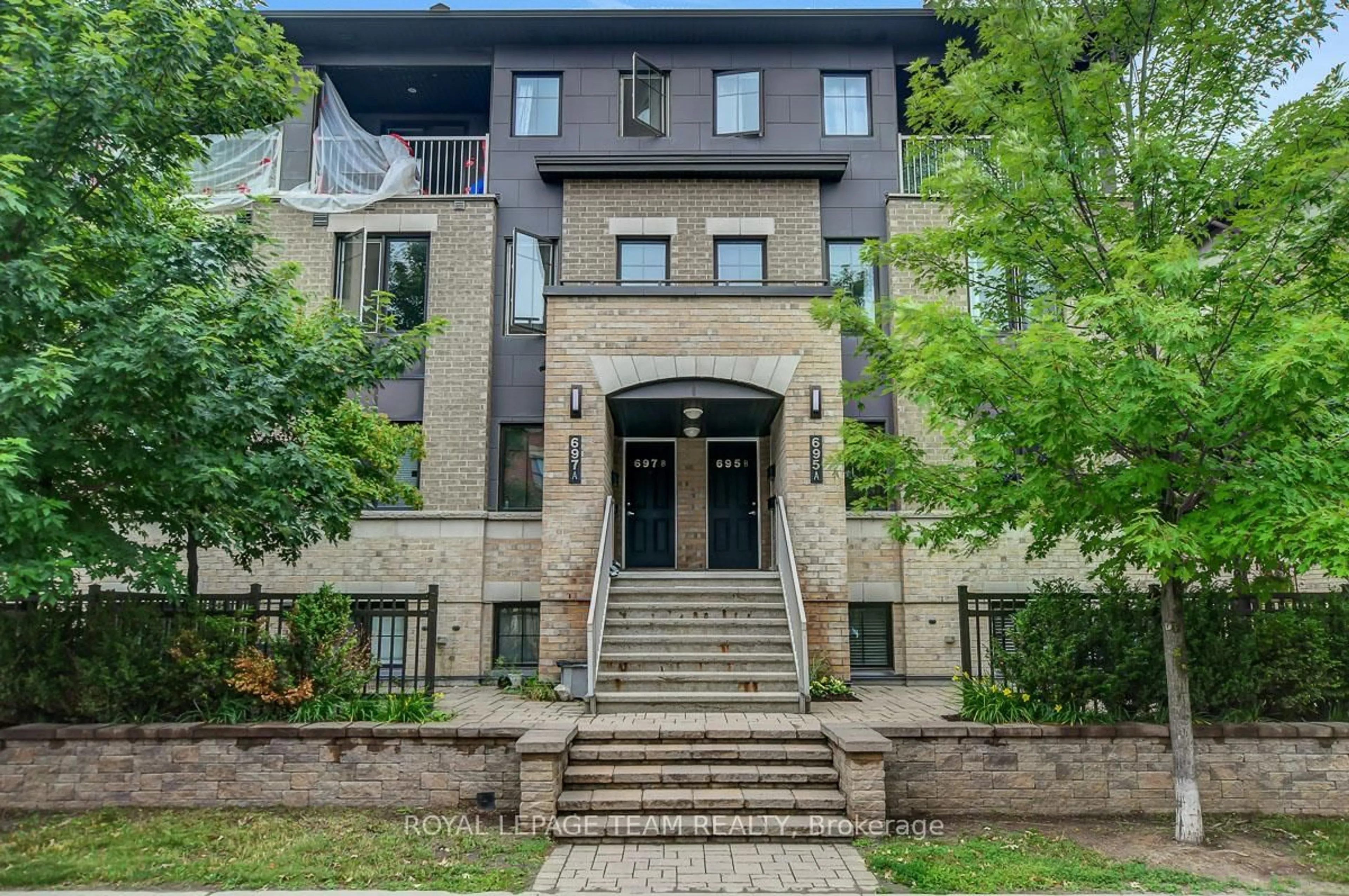 Home with brick exterior material, street for 695A Sue Holloway Dr, Ottawa Ontario K2J 5R6
