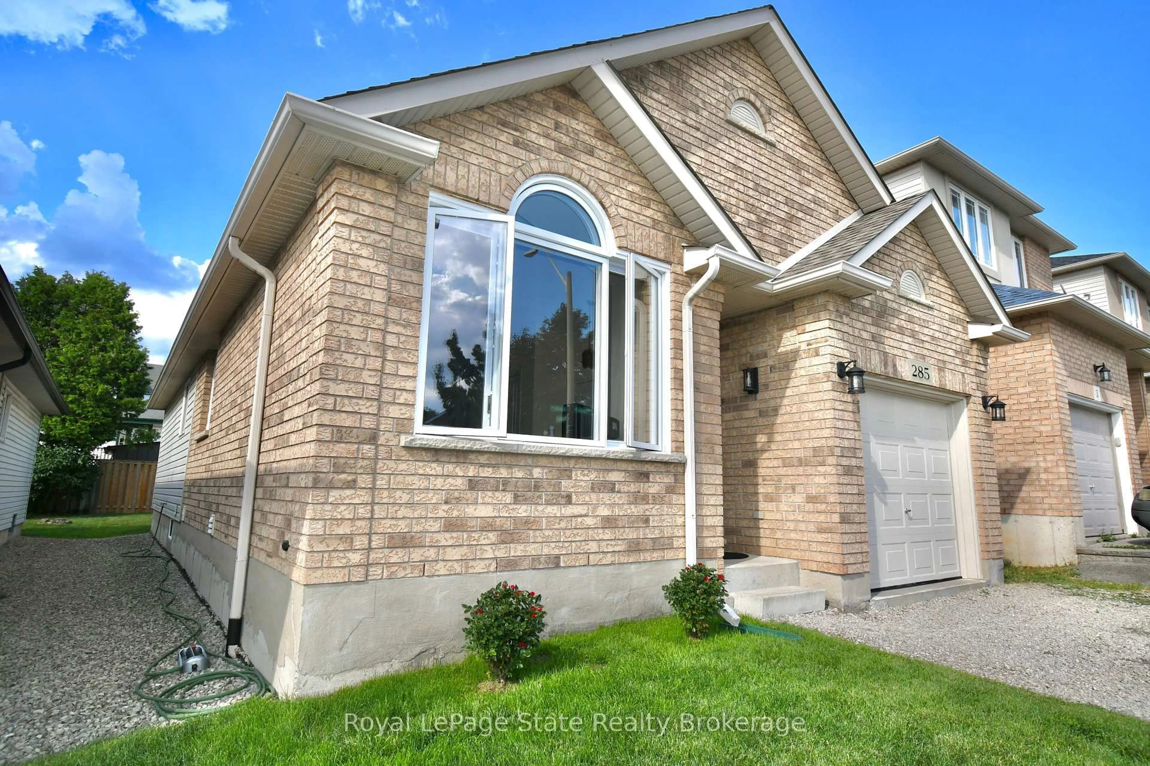 Home with brick exterior material, street for 285 Acadia Dr, Hamilton Ontario L8W 3L1