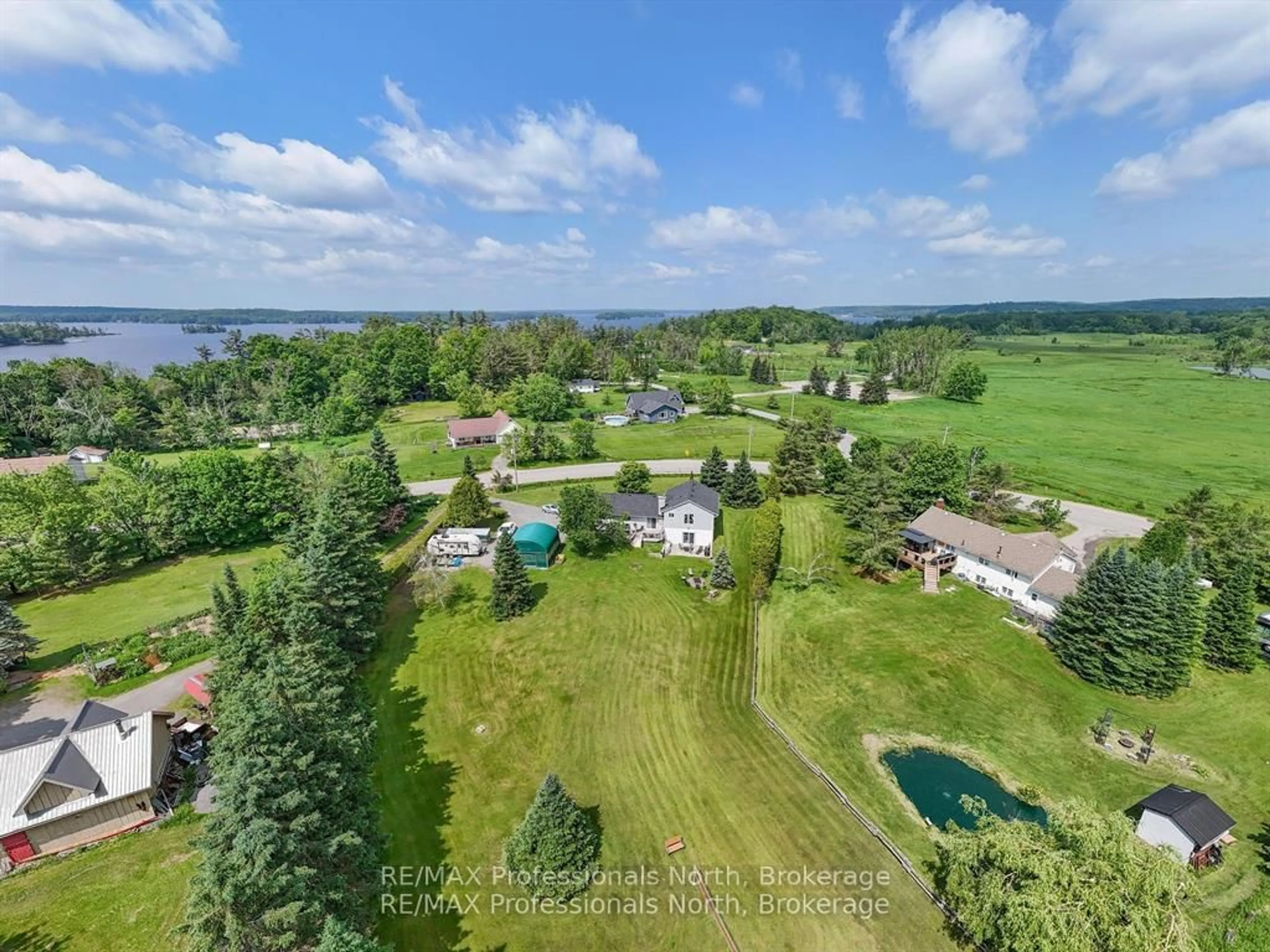 A pic from outside/outdoor area/front of a property/back of a property/a pic from drone, water/lake/river/ocean view for 1287 Golden Beach Rd, Bracebridge Ontario P1L 1C5