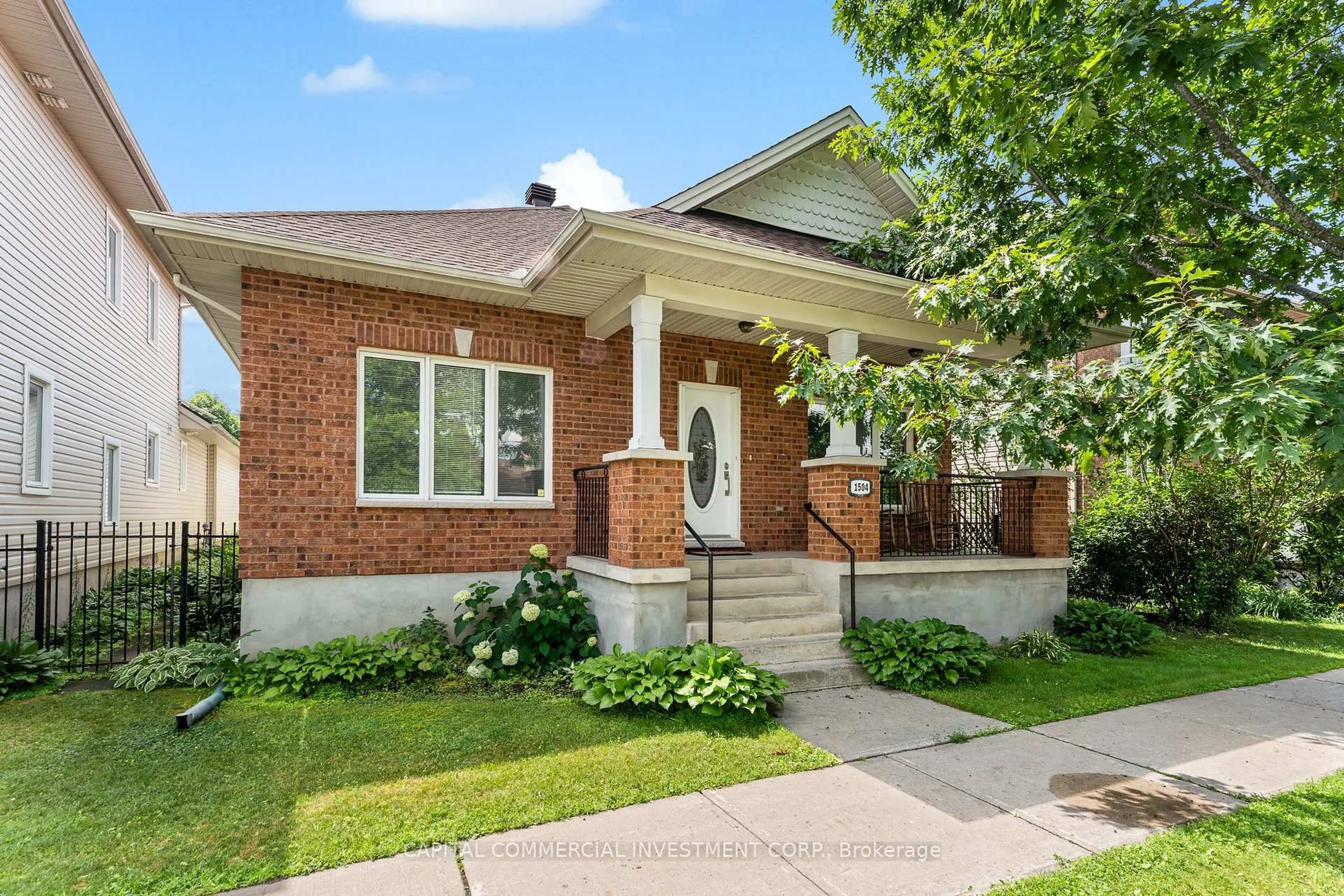 Home with brick exterior material, street for 1504 Queensdale Ave, Ottawa Ontario K1T 4G3