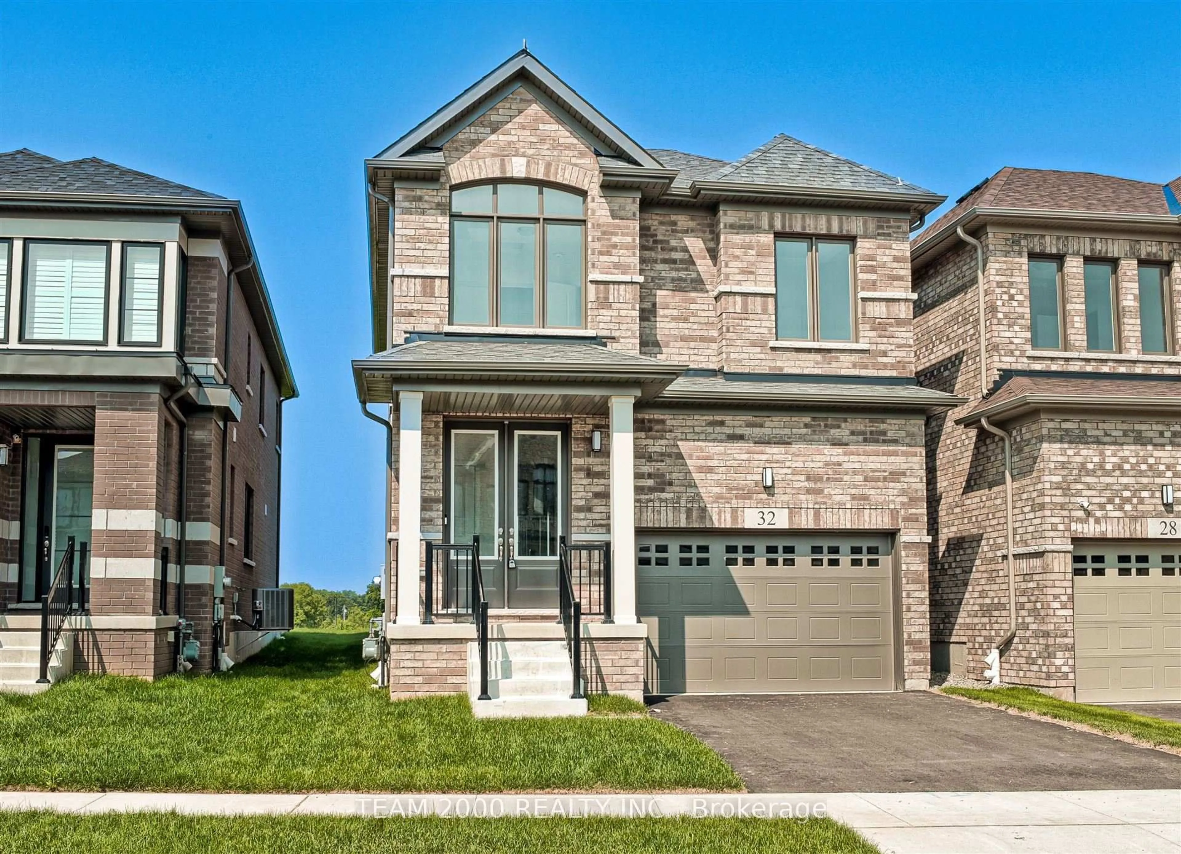 Home with brick exterior material, street for 32 Langridge Way, Cambridge Ontario N1S 0E7