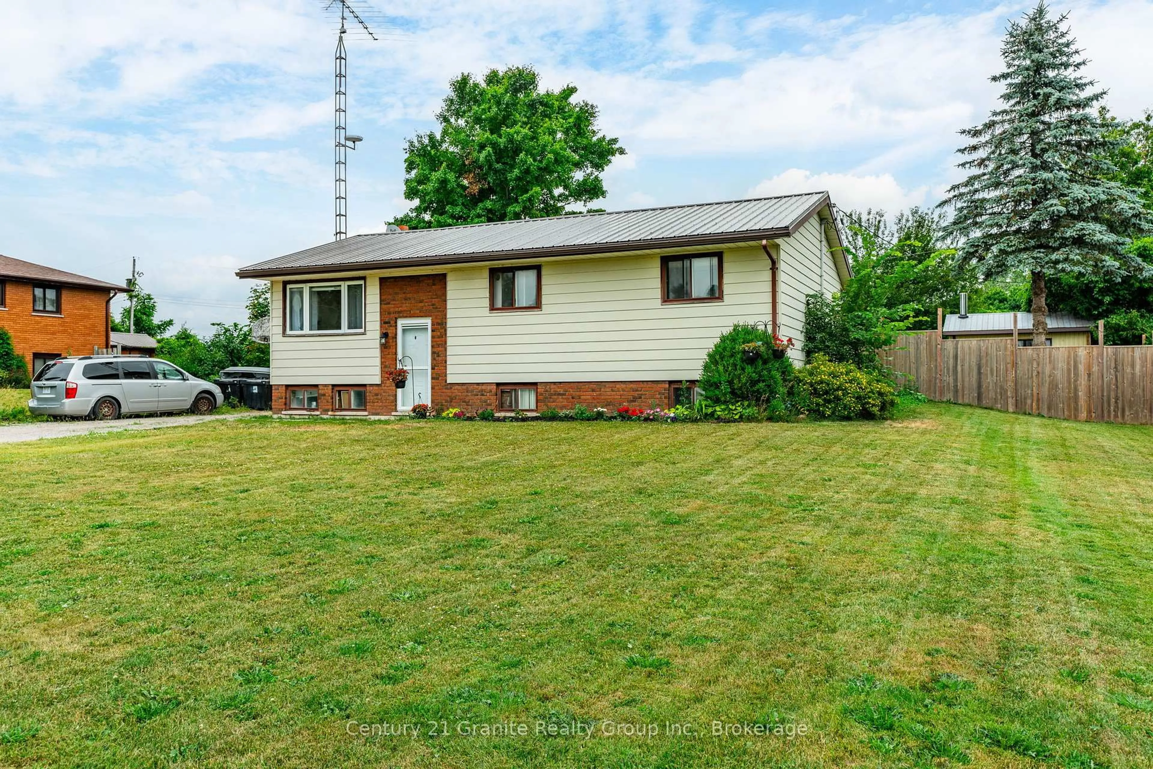 Home with vinyl exterior material, street for 32 Cameron Rd, Kawartha Lakes Ontario K0M 1G0
