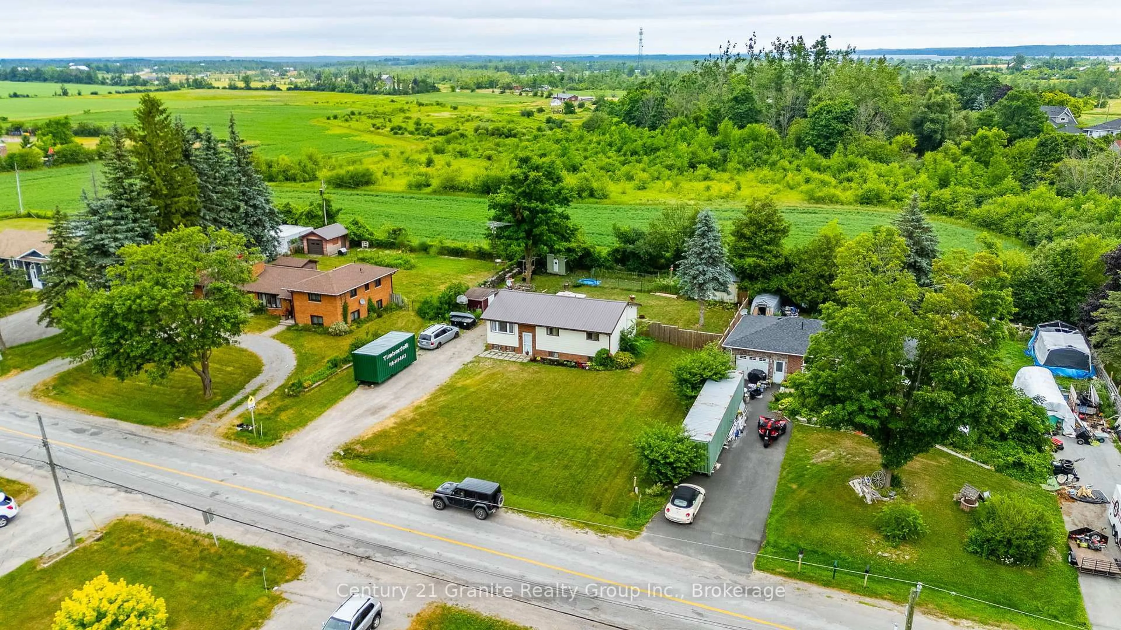 A pic from outside/outdoor area/front of a property/back of a property/a pic from drone, street for 32 Cameron Rd, Kawartha Lakes Ontario K0M 1G0