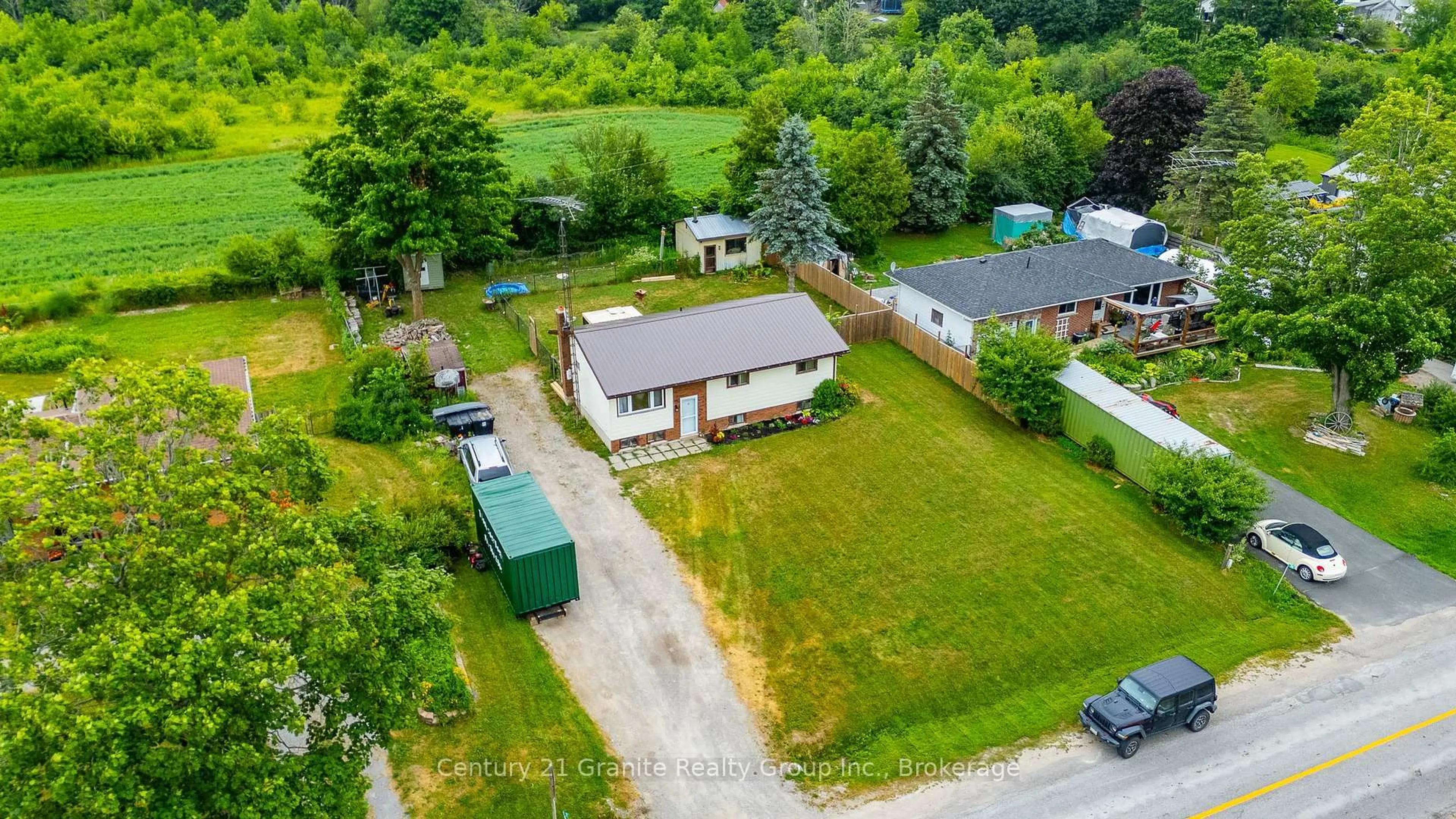 A pic from outside/outdoor area/front of a property/back of a property/a pic from drone, street for 32 Cameron Rd, Kawartha Lakes Ontario K0M 1G0