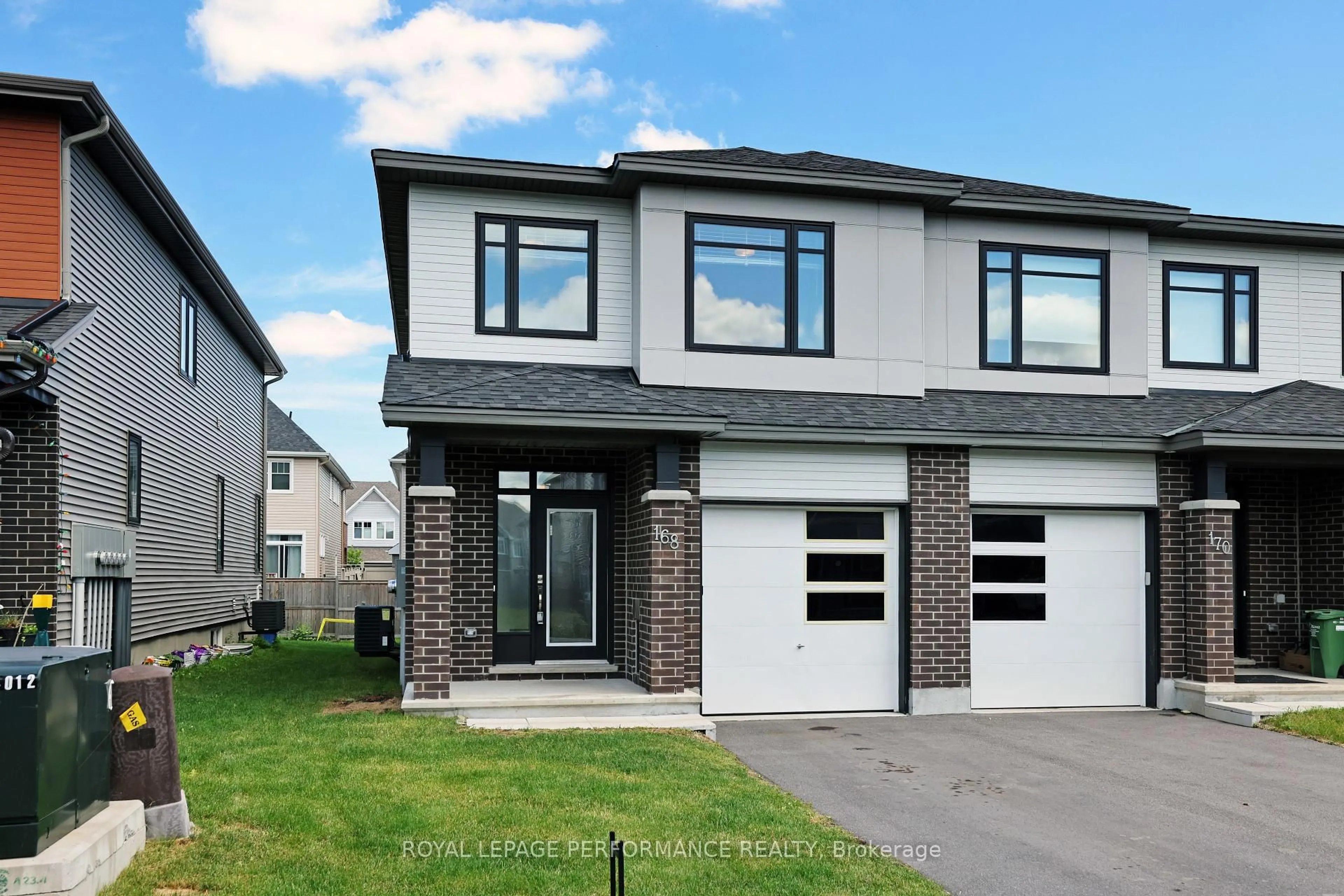Home with brick exterior material, street for 168 Angelonia Cres, Ottawa Ontario K1T 0Y5
