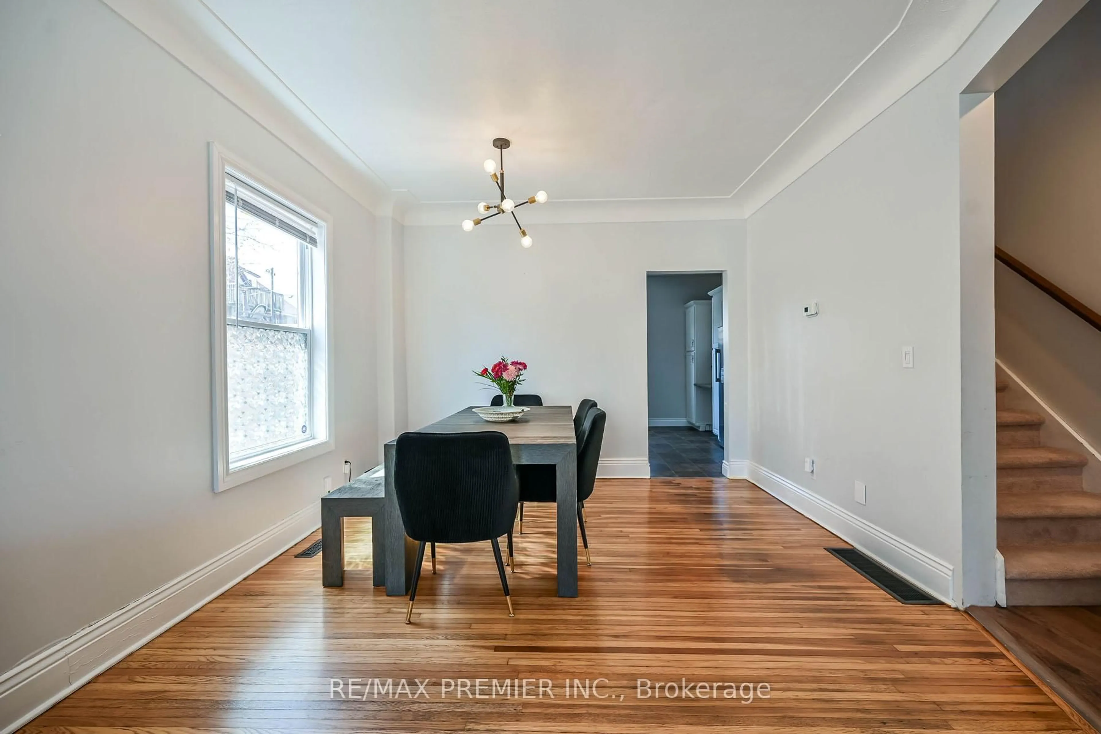 Dining room, wood/laminate floor for 53 Douglas Ave, Hamilton Ontario L8L 5R2