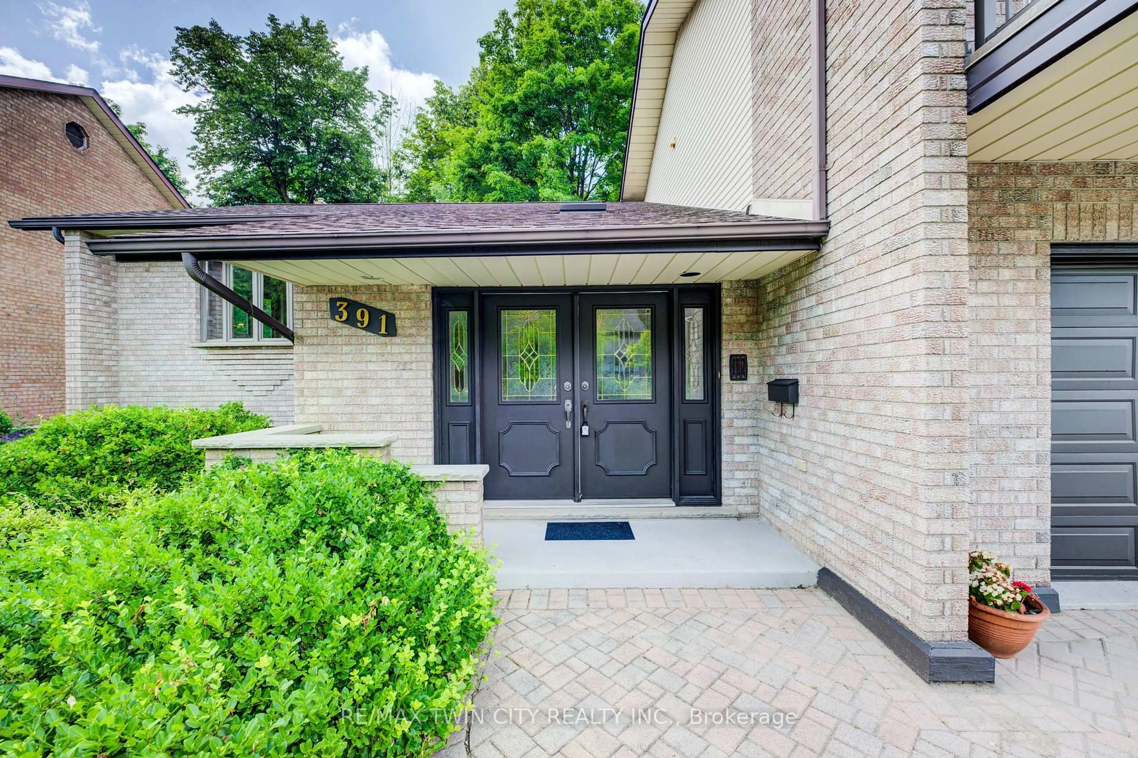 Home with brick exterior material, street for 391 Northlake Dr, Waterloo Ontario N2V 1W8
