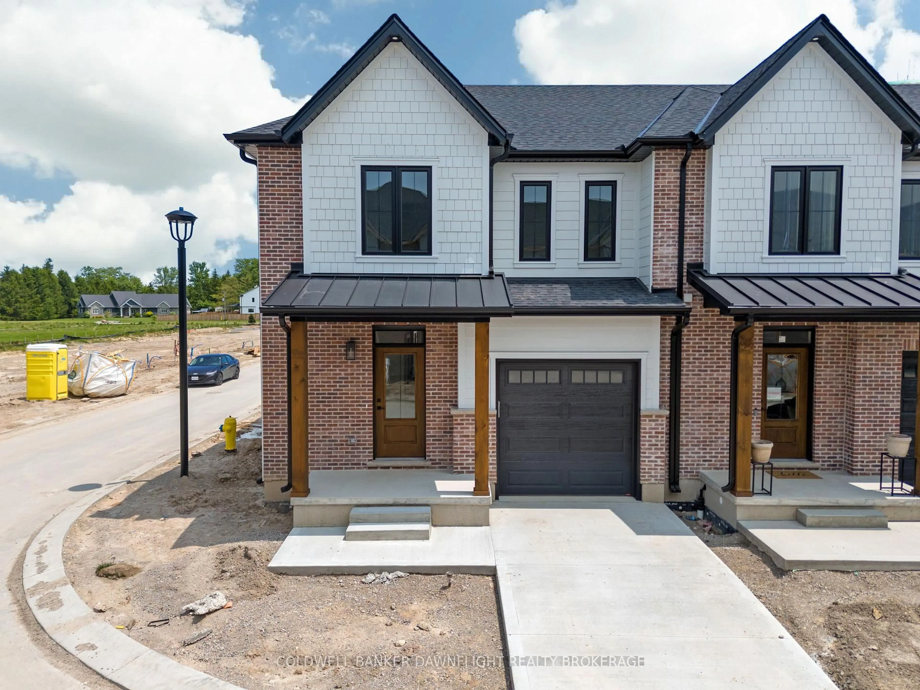Home with brick exterior material, street for 147 SCOTTS Dr #28, Lucan Biddulph Ontario N0M 2J0