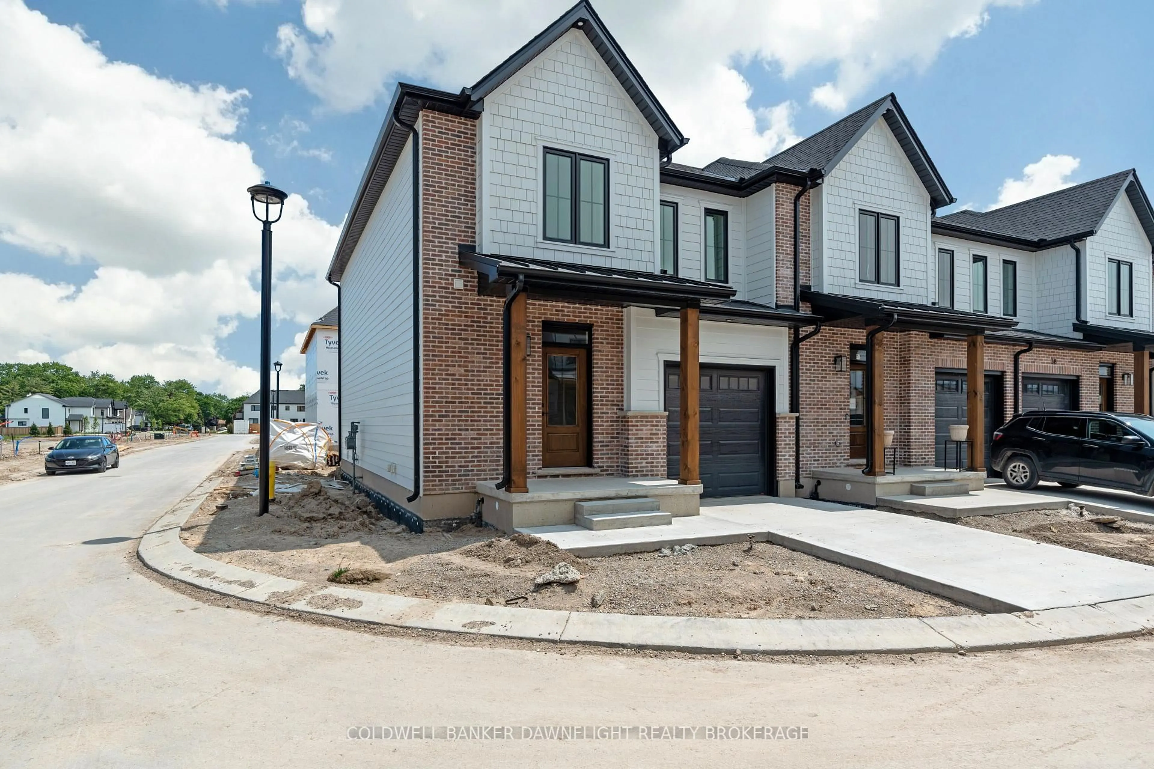 Home with brick exterior material, street for 147 SCOTTS Dr #28, Lucan Biddulph Ontario N0M 2J0