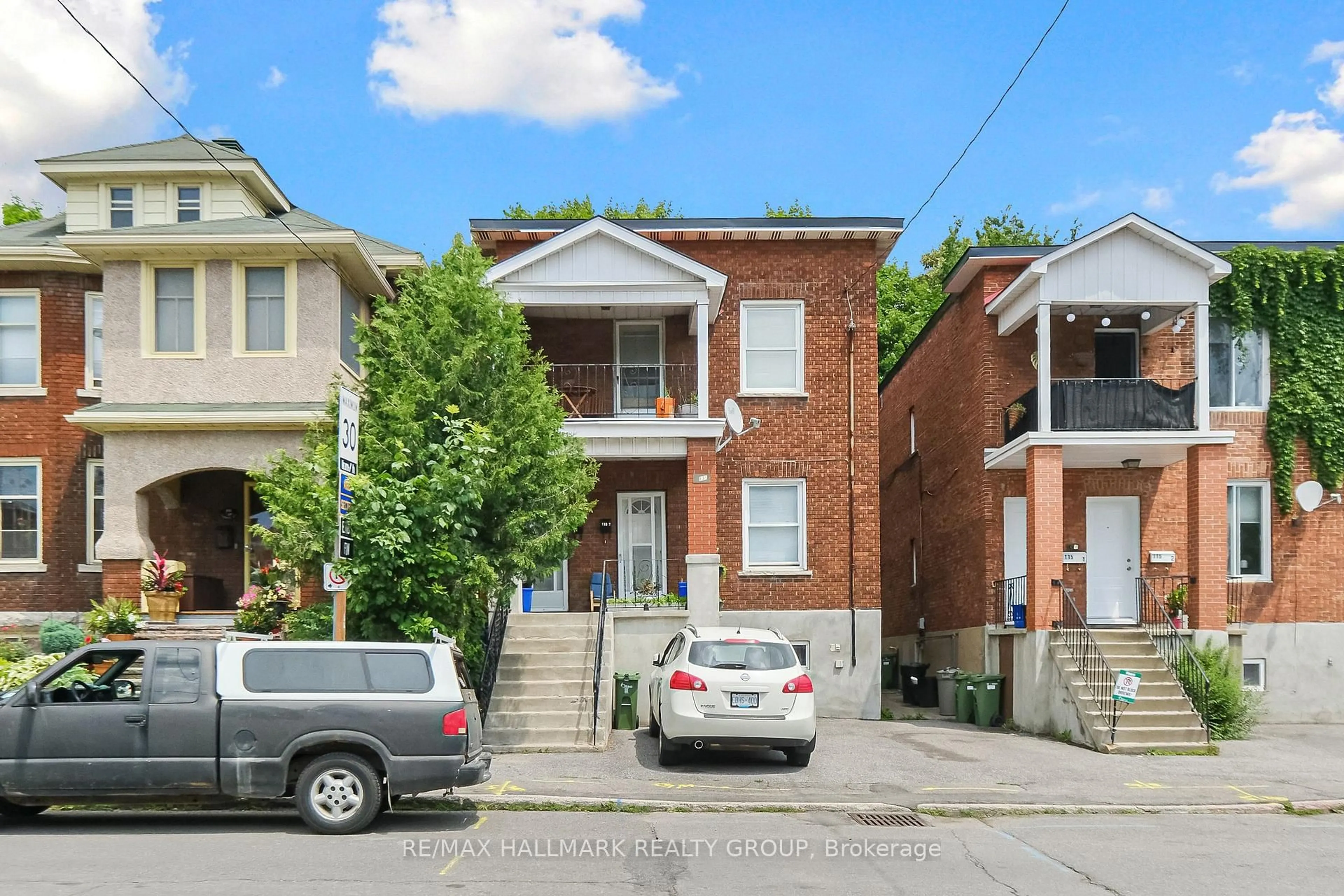 Home with brick exterior material, street for 113/113 1/2 Fairmont Ave, Ottawa Ontario K1Y 1X7