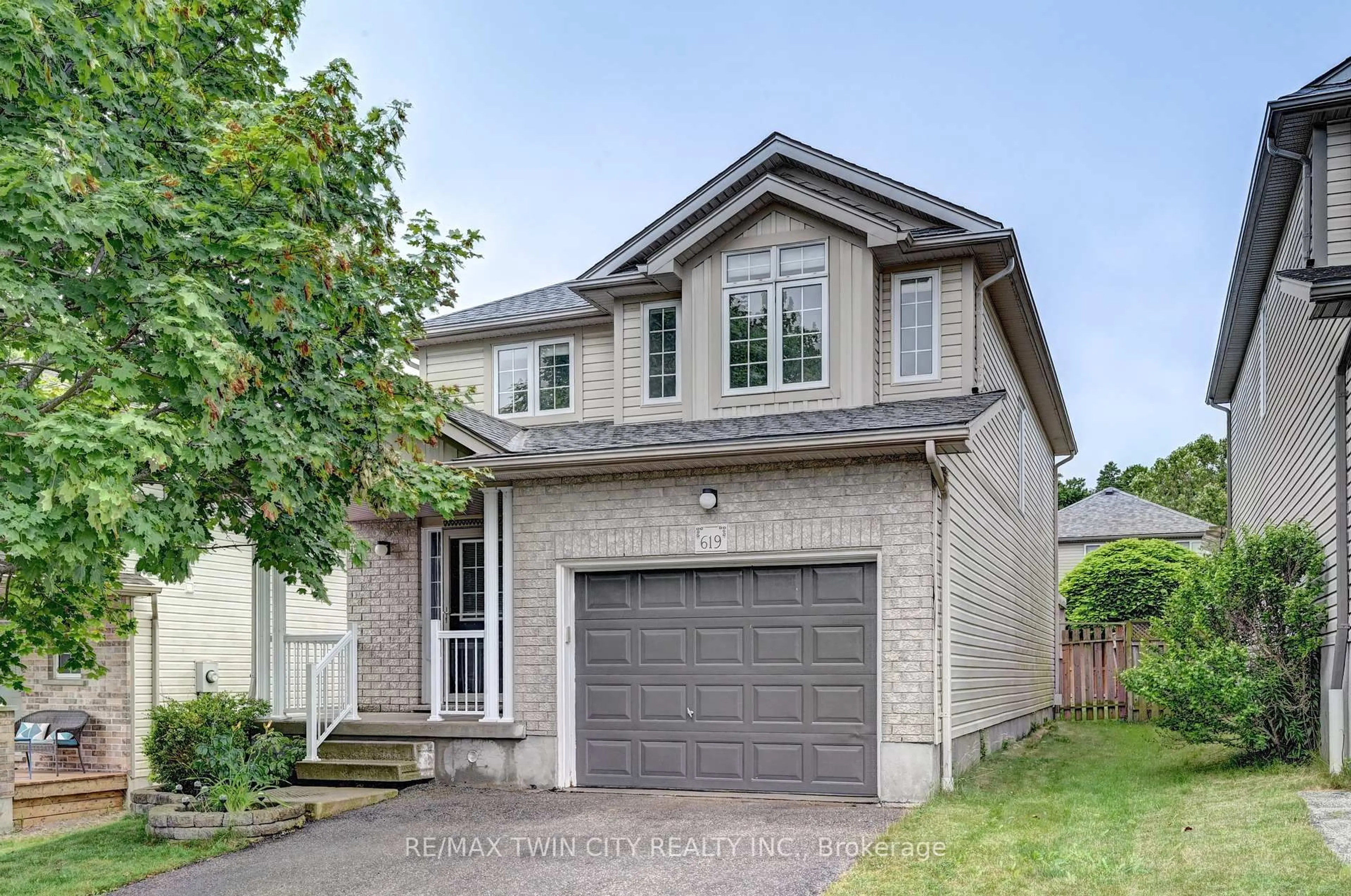 Home with brick exterior material, street for 619 Mountain Maple Ave, Waterloo Ontario N2V 2P4