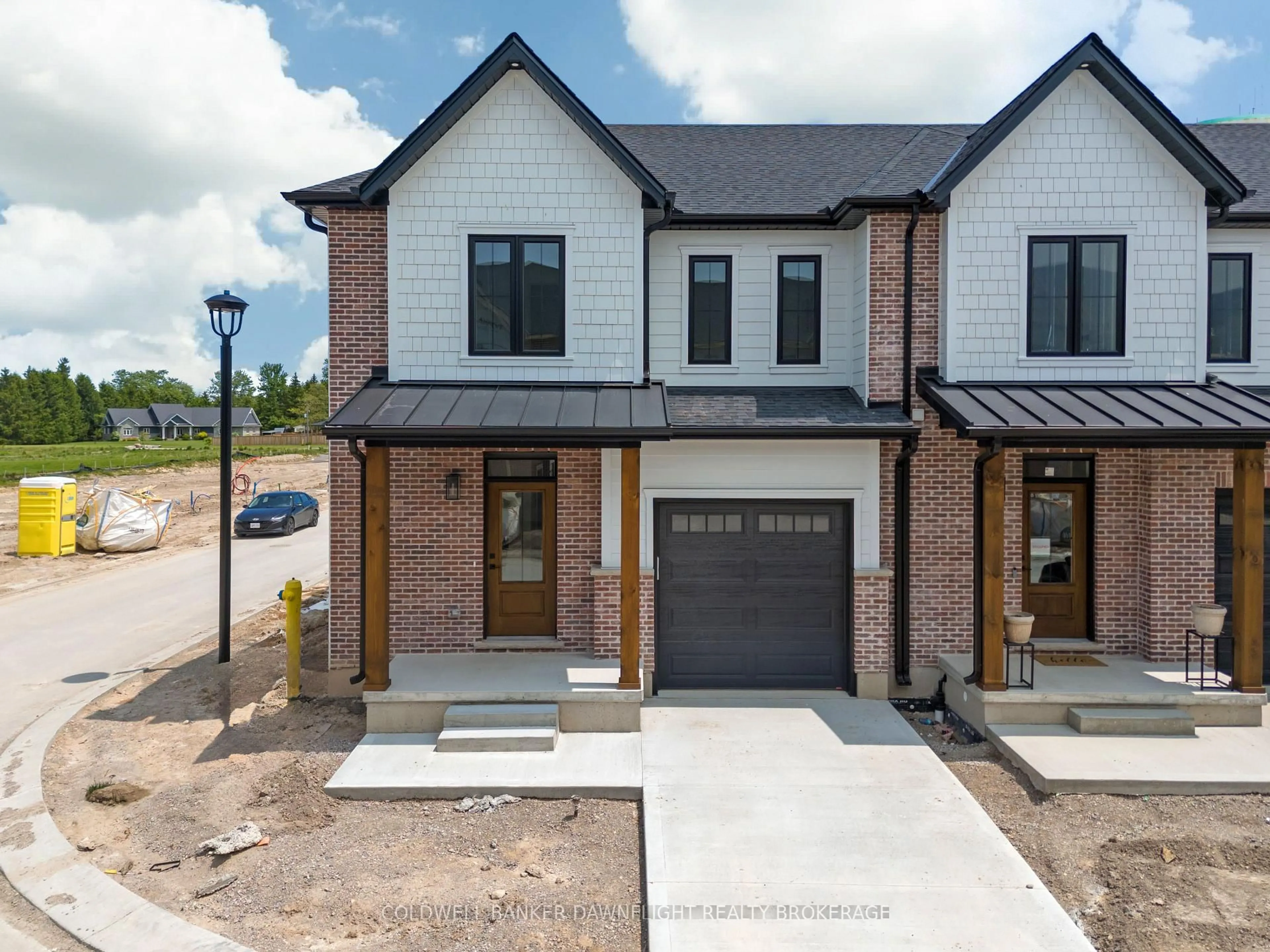 Home with brick exterior material, street for 147 Scotts Dr #44, Lucan Biddulph Ontario N0M 2J0