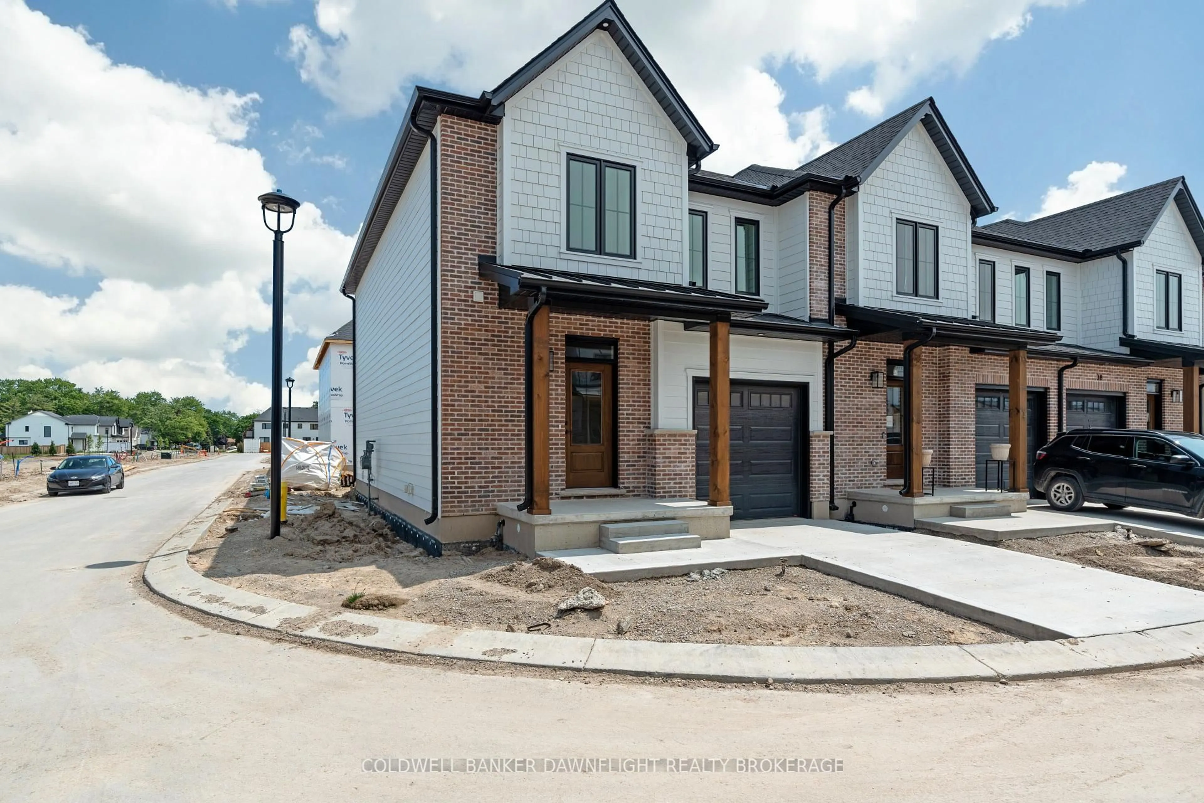 Home with brick exterior material, street for 147 Scotts Dr #44, Lucan Biddulph Ontario N0M 2J0