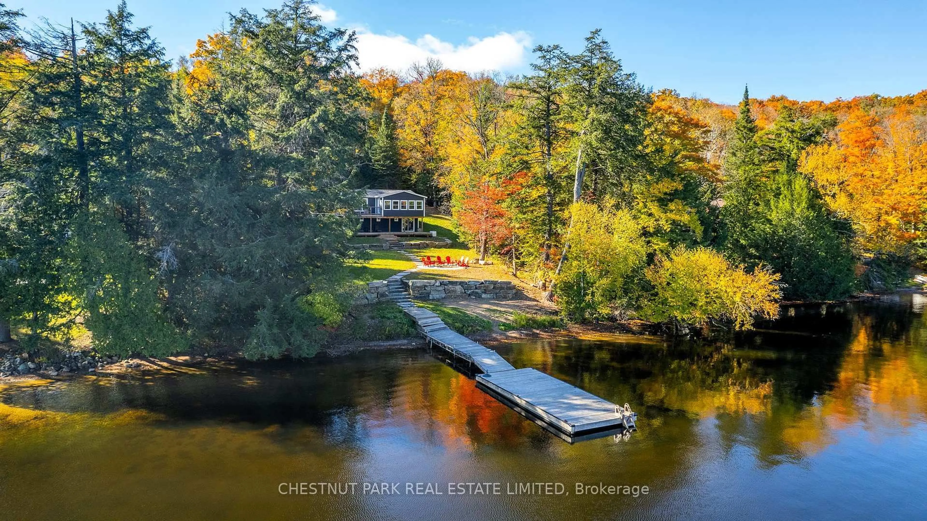 A pic from outside/outdoor area/front of a property/back of a property/a pic from drone, water/lake/river/ocean view for 1060 Inawendawin Rd, Lake of Bays Ontario P0A 1E0