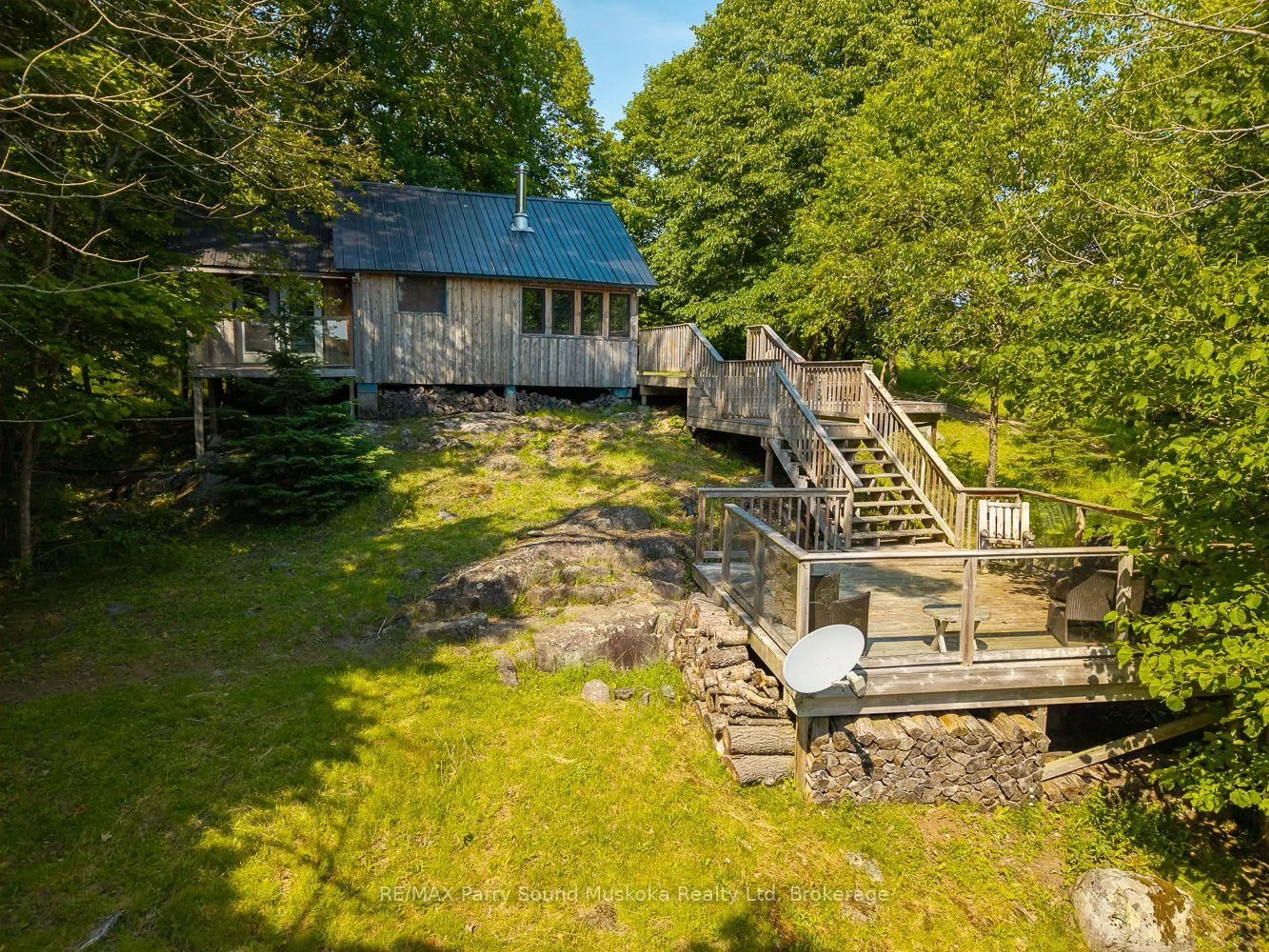 A pic from outside/outdoor area/front of a property/back of a property/a pic from drone, water/lake/river/ocean view for 274 Chur Lee Rd, Whitestone Ontario P0A 1G0