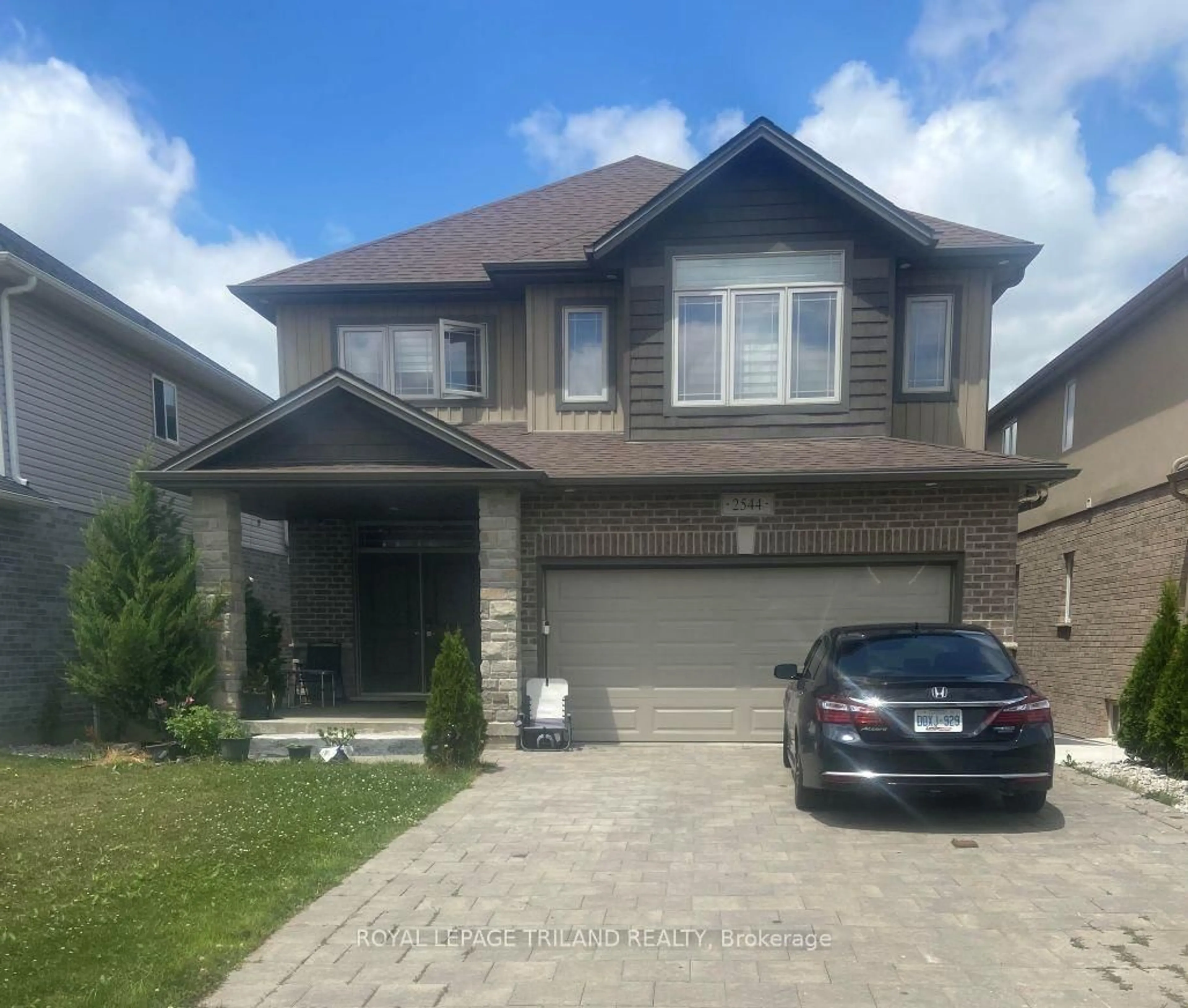 Home with brick exterior material, street for 2544 Holbrook Dr, London South Ontario N6M 1G5