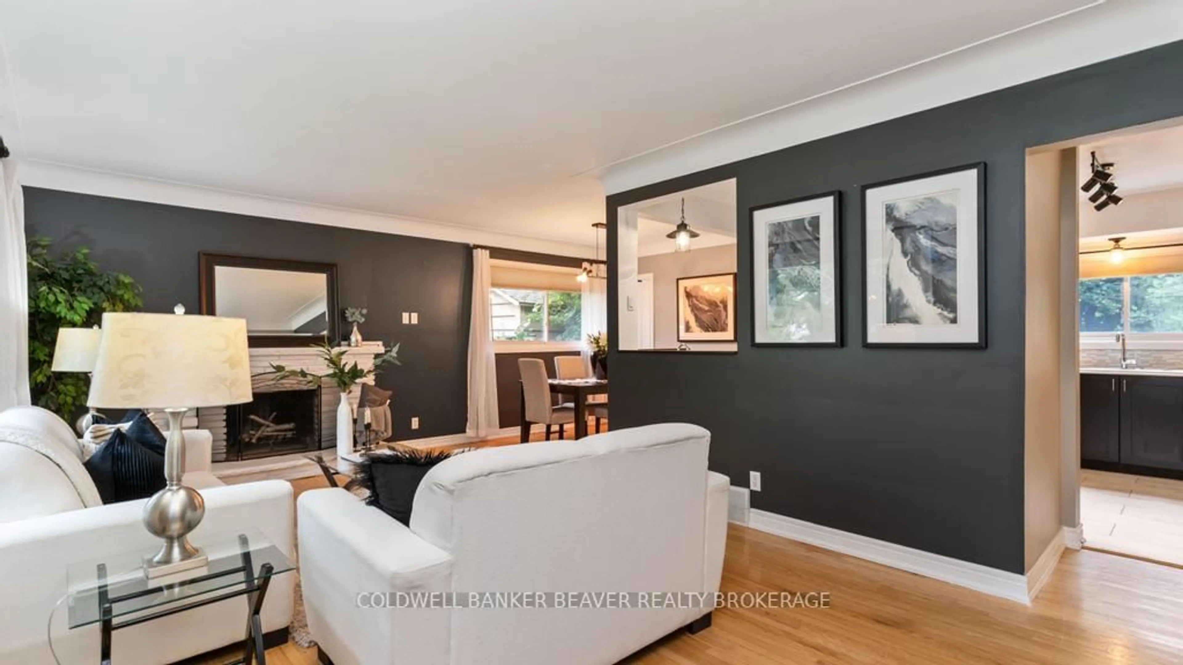 Living room with furniture, wood/laminate floor for 487 Cypress Ave, London North Ontario N6H 3R4