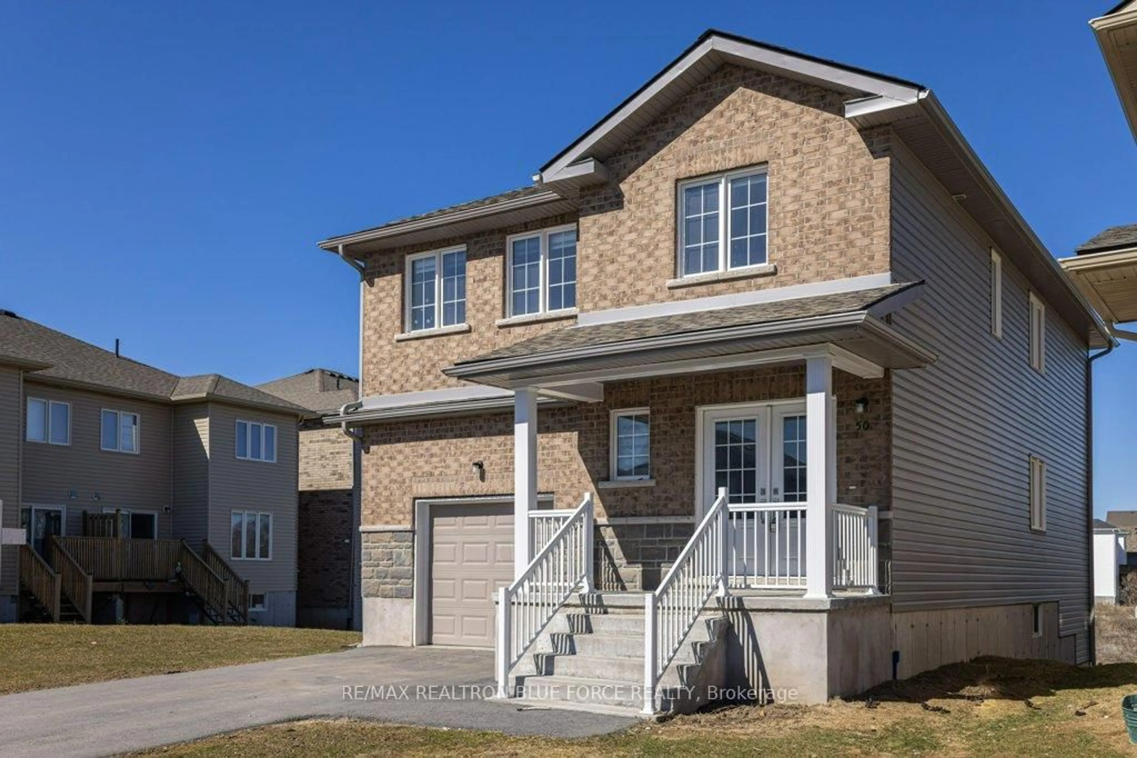 Home with brick exterior material, street for 50 Brennan Cres, Bissett Creek Ontario K0H 2H0