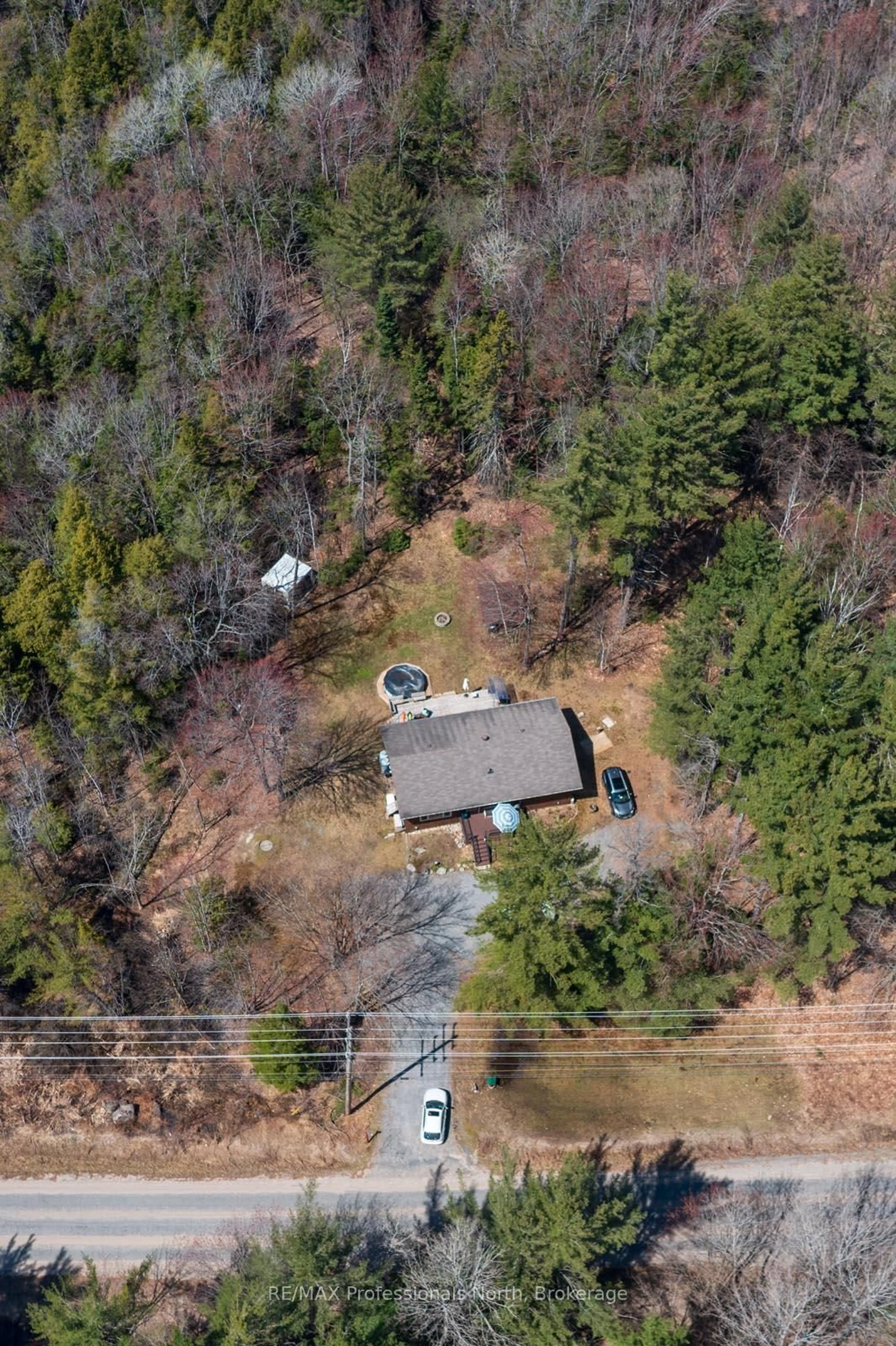A pic from outside/outdoor area/front of a property/back of a property/a pic from drone, unknown for 224 Stephenson 4 Rd, Huntsville Ontario P0B 1M0