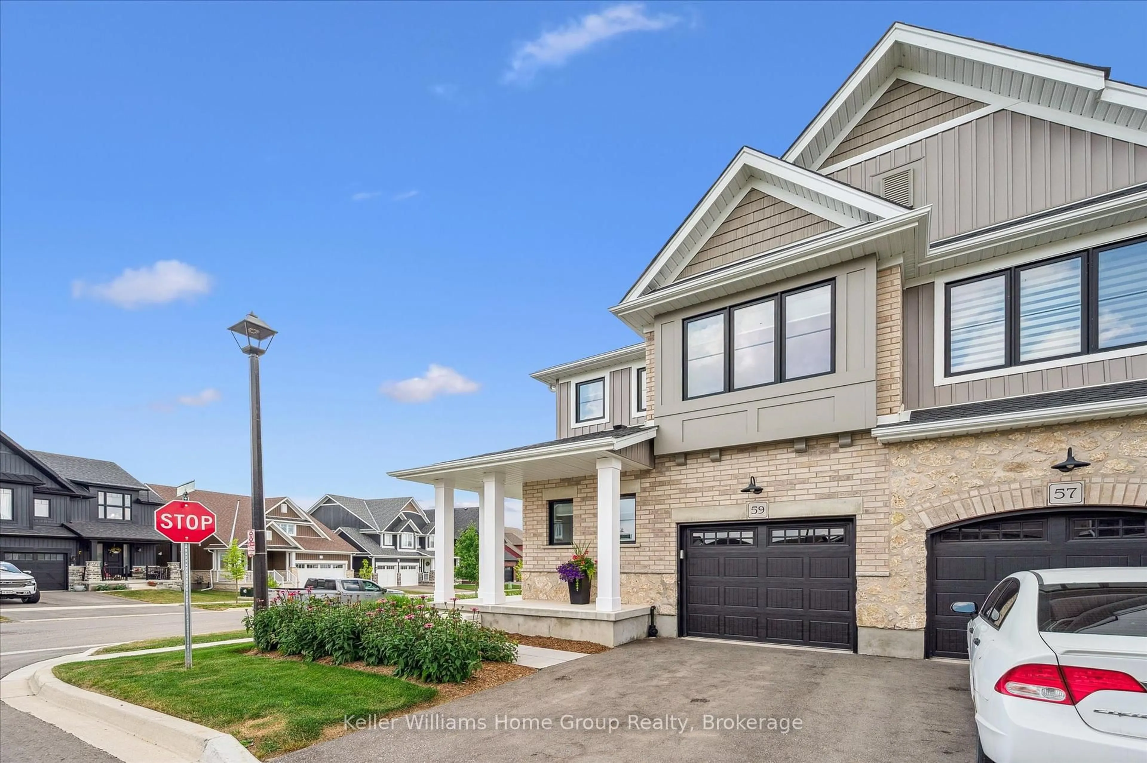 Home with brick exterior material, street for 59 Hedley Lane, Centre Wellington Ontario N0B 1S0