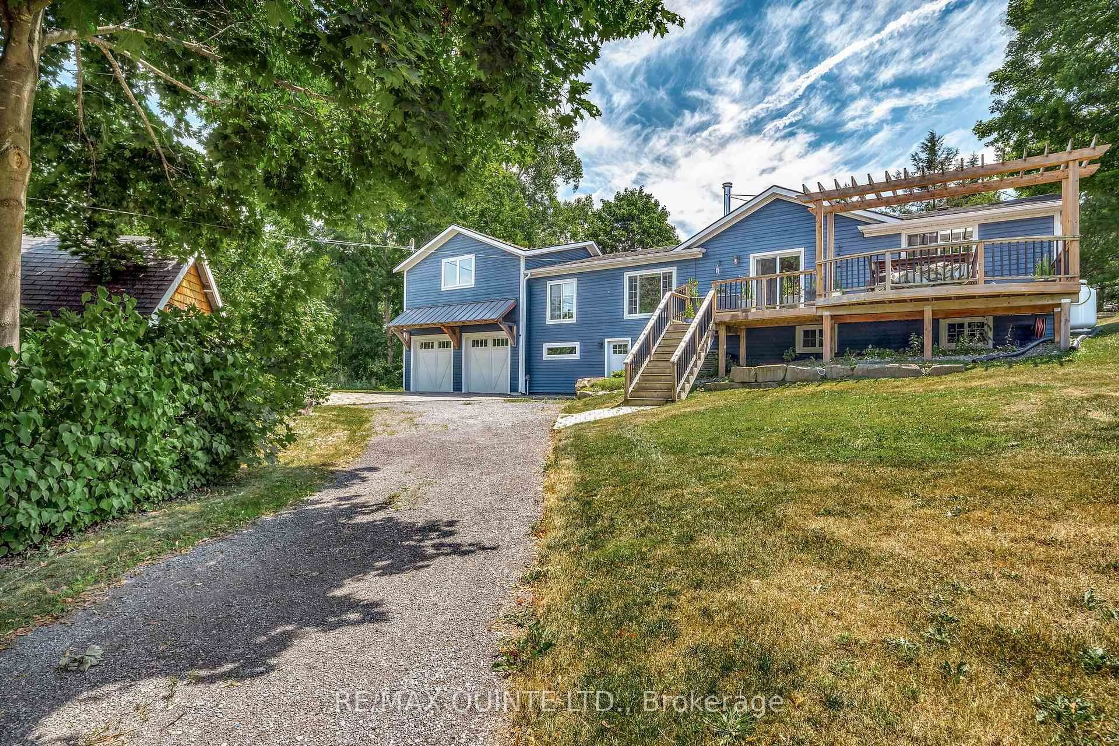 A pic from outside/outdoor area/front of a property/back of a property/a pic from drone, street for 14 Eastern Ave, Prince Edward County Ontario K8N 4Z1