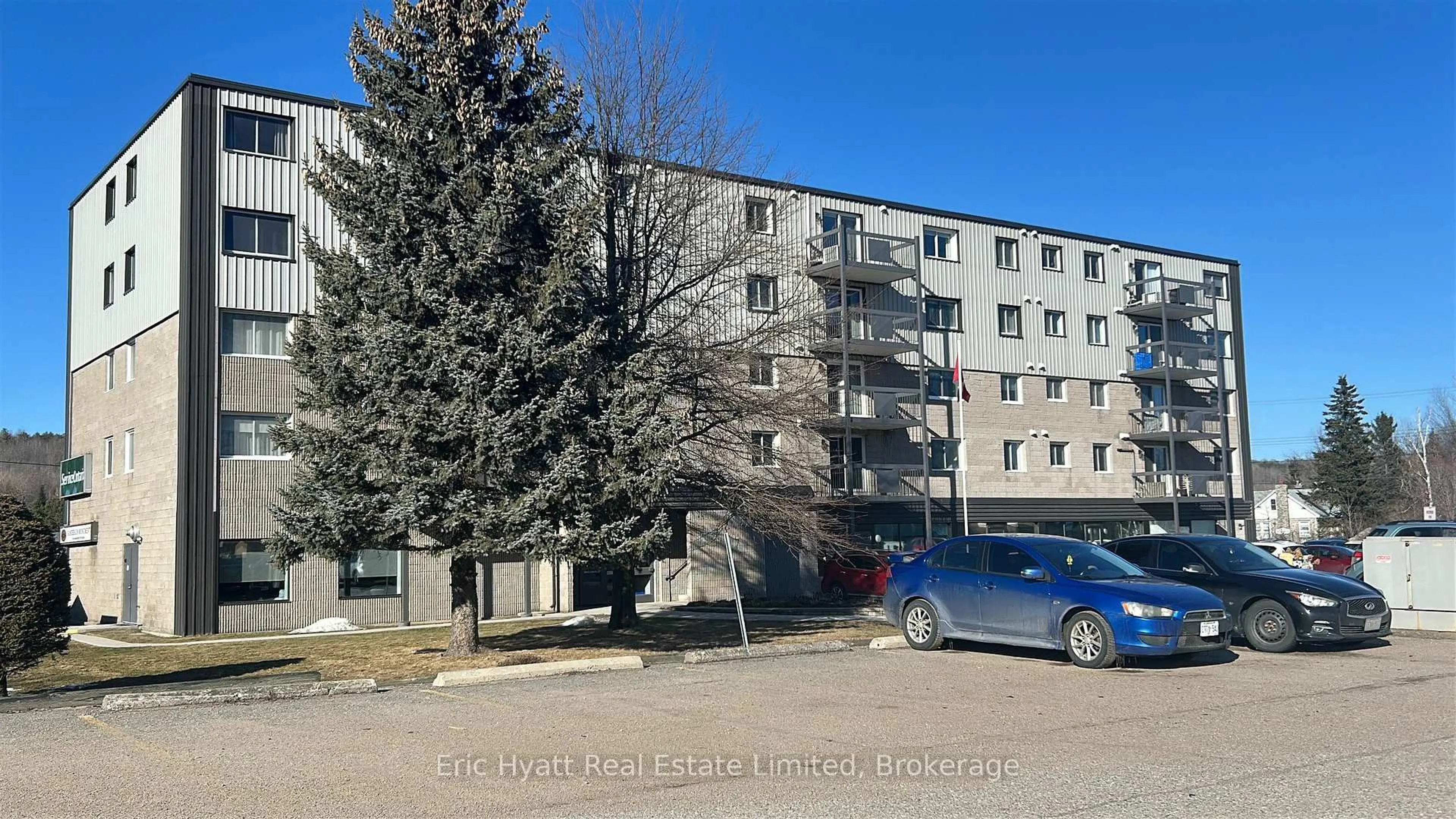 A pic from outside/outdoor area/front of a property/back of a property/a pic from drone, unknown for 955 Stockdale Rd #205, North Bay Ontario P1B 9G3